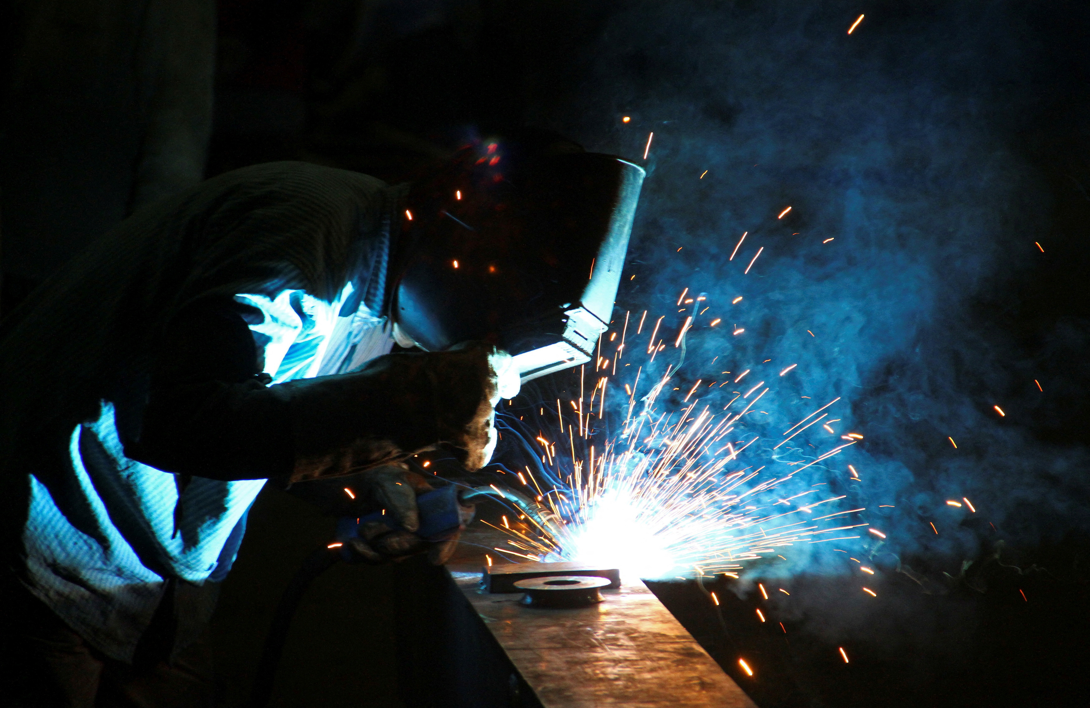 A man works inside a steel factory at Ludhiana in the northern Indian state of Punjab