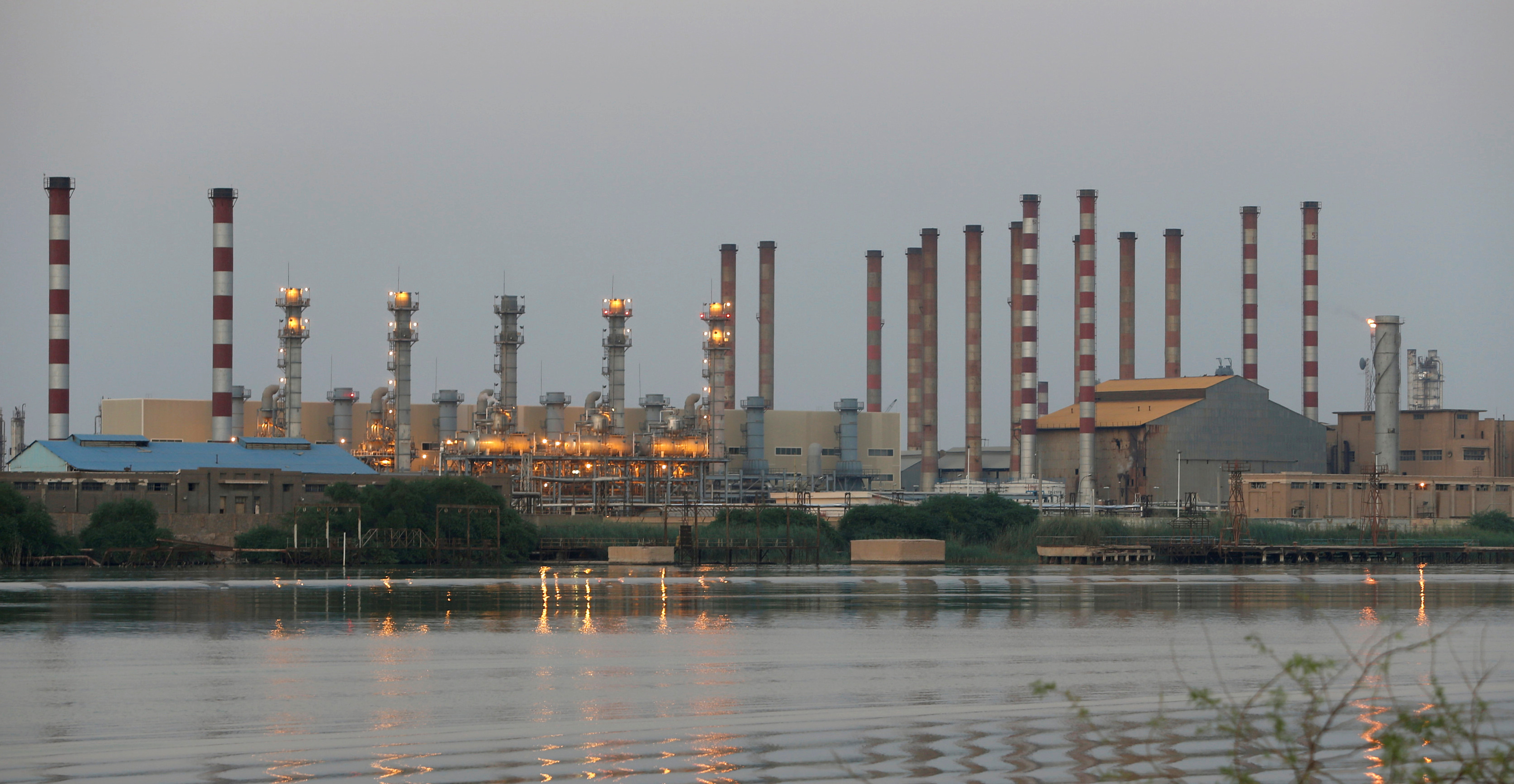 A general view of Abadan oil refinery in southwest Iran, is pictured from Iraqi side of Shatt al-Arab in Al-Faw south of Basra