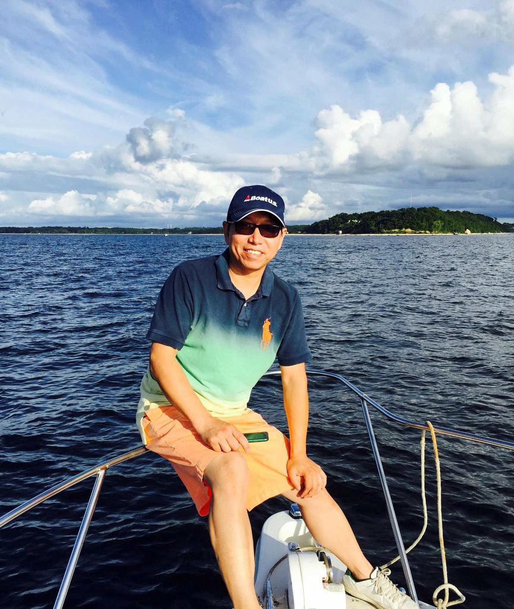 Chinese-American citizen Kai Li, who has been detained in China since 2016, poses for a picture while fishing on the Long Island Sound