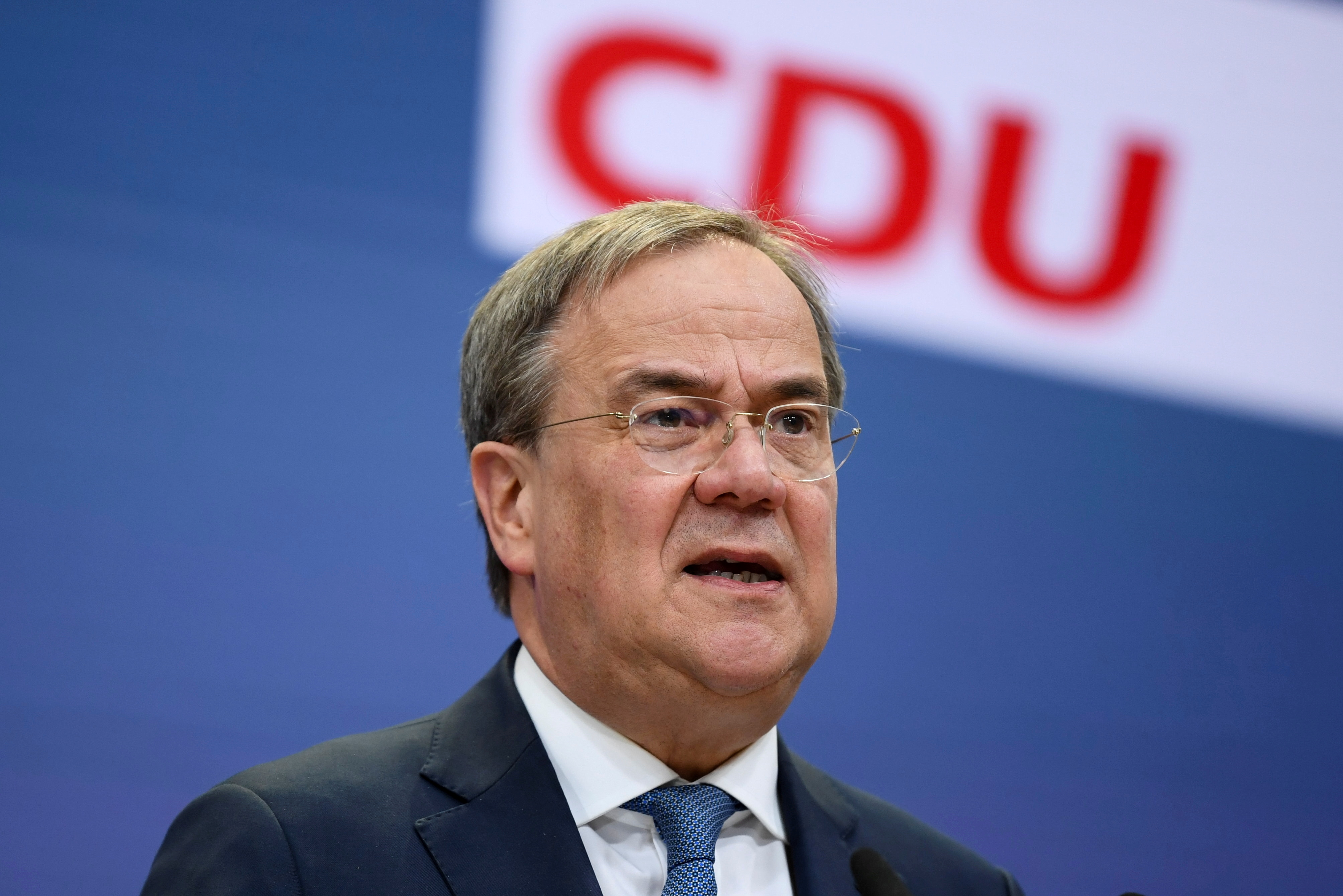 Conservative Laschet struggles for momentum in German leadership race | Reuters