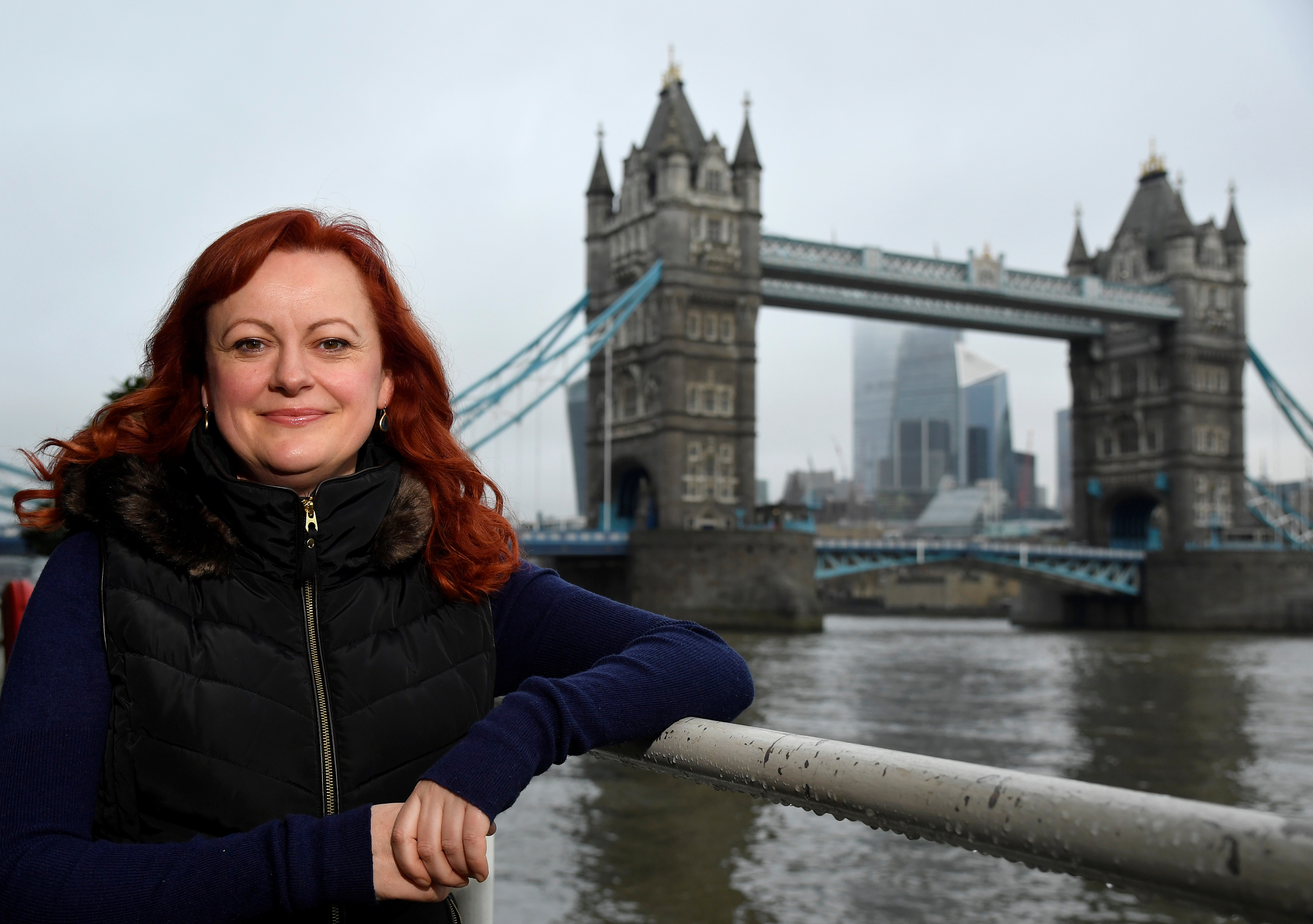 Solitaire Townsend, co-founder of Futerra advertising firm, poses for a portrait, with Tower Bridge seen behind in London, Britain December 11, 2020.  REUTERS/Toby Melville