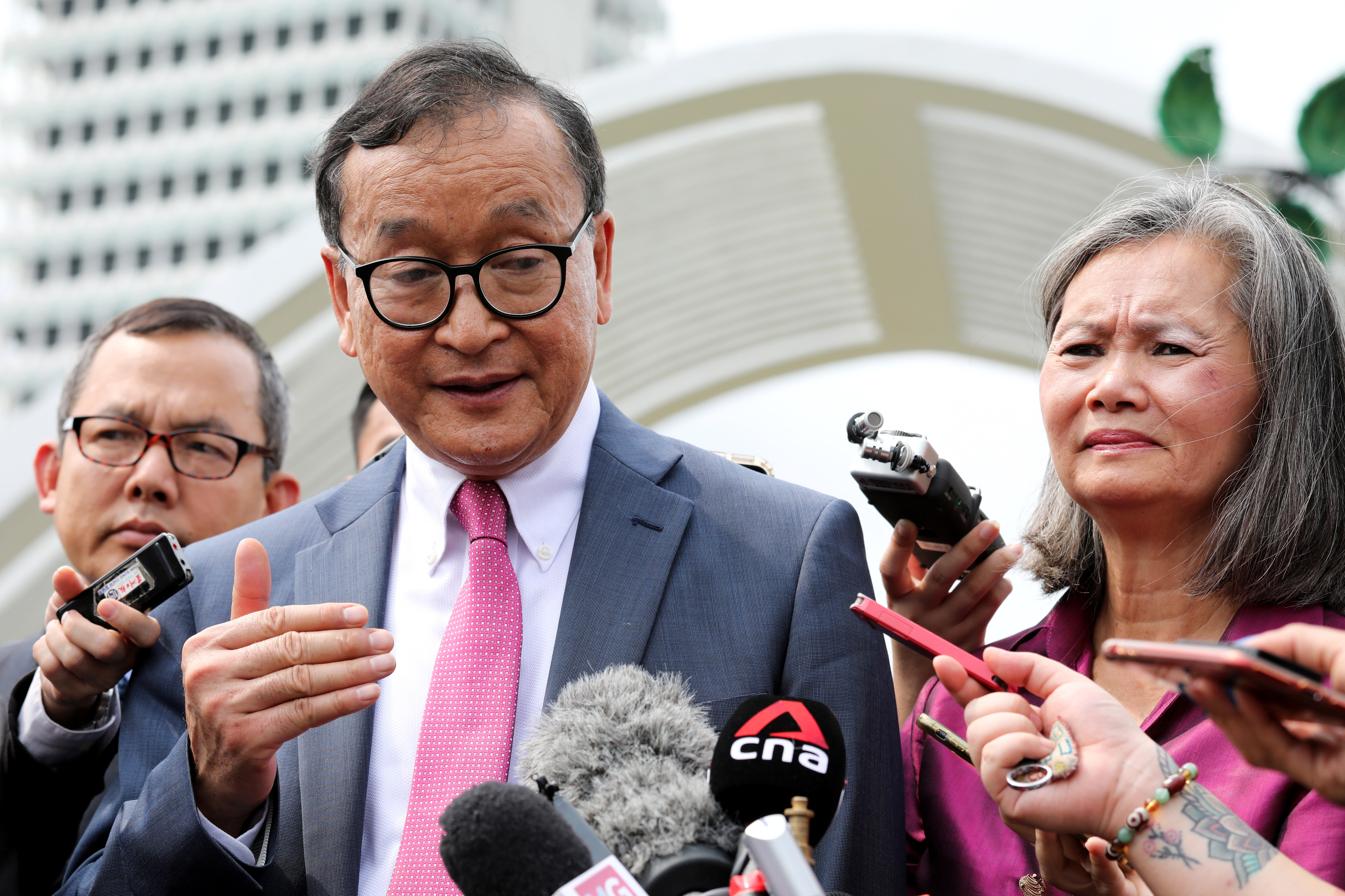 Self-exiled Cambodian opposition party founder Sam Rainsy and Mu Sochua, Deputy President of the Cambodia National Rescue Party (CNRP), speak to members of the media in Kuala Lumpur