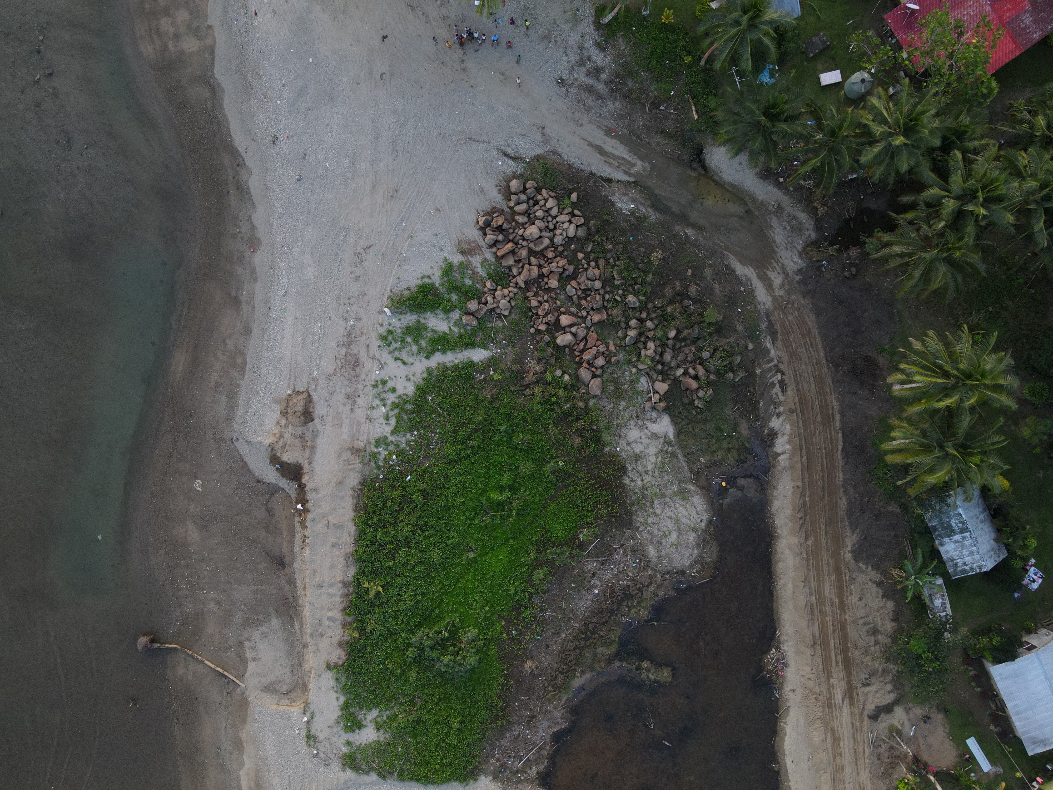 Fijian villagers choose to stay and fight to save their homes from rising sea levels