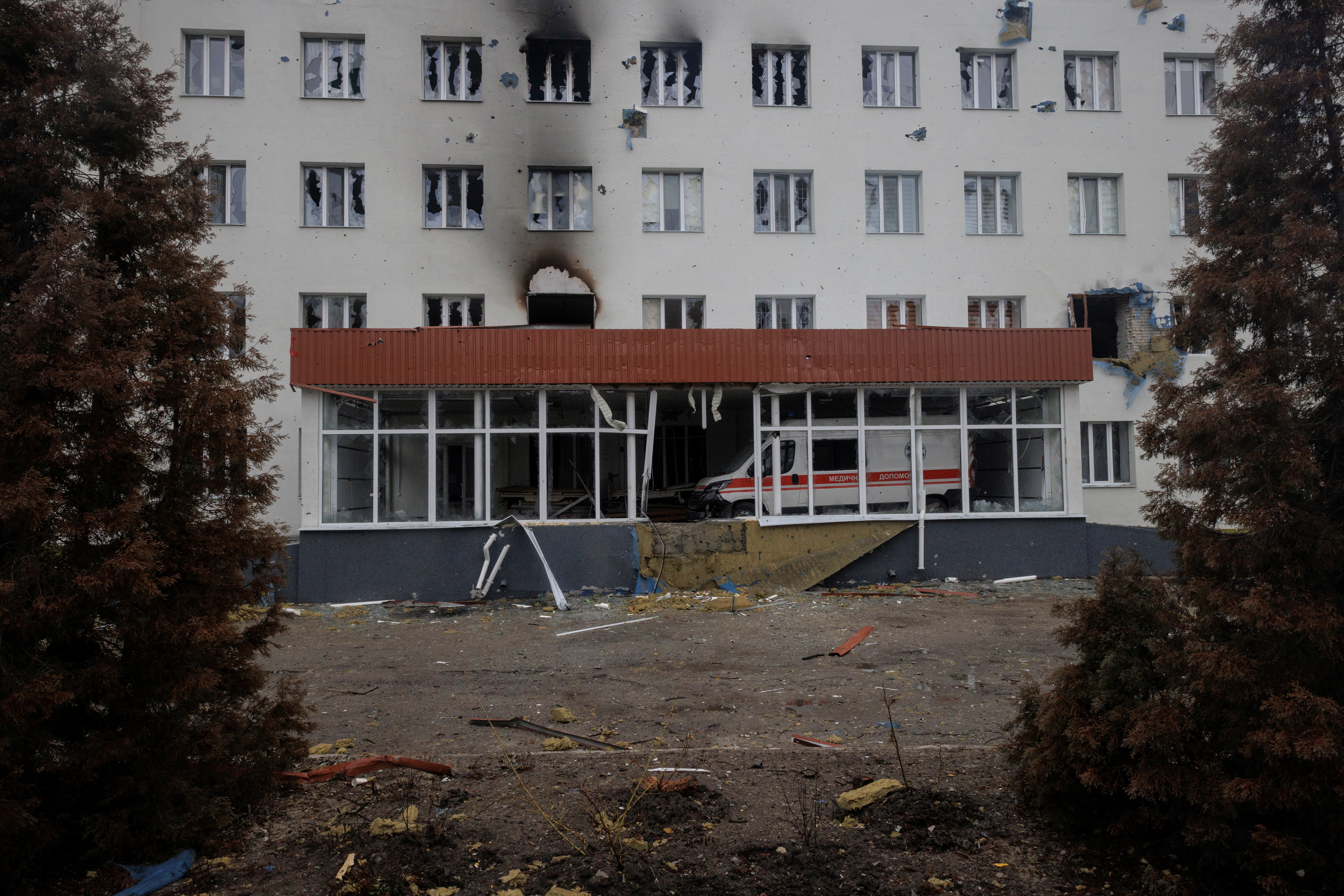 The damaged facade of a hospital is seen in Trostyanets, which staff said Russian troops fired at with tanks during their occupation of the town