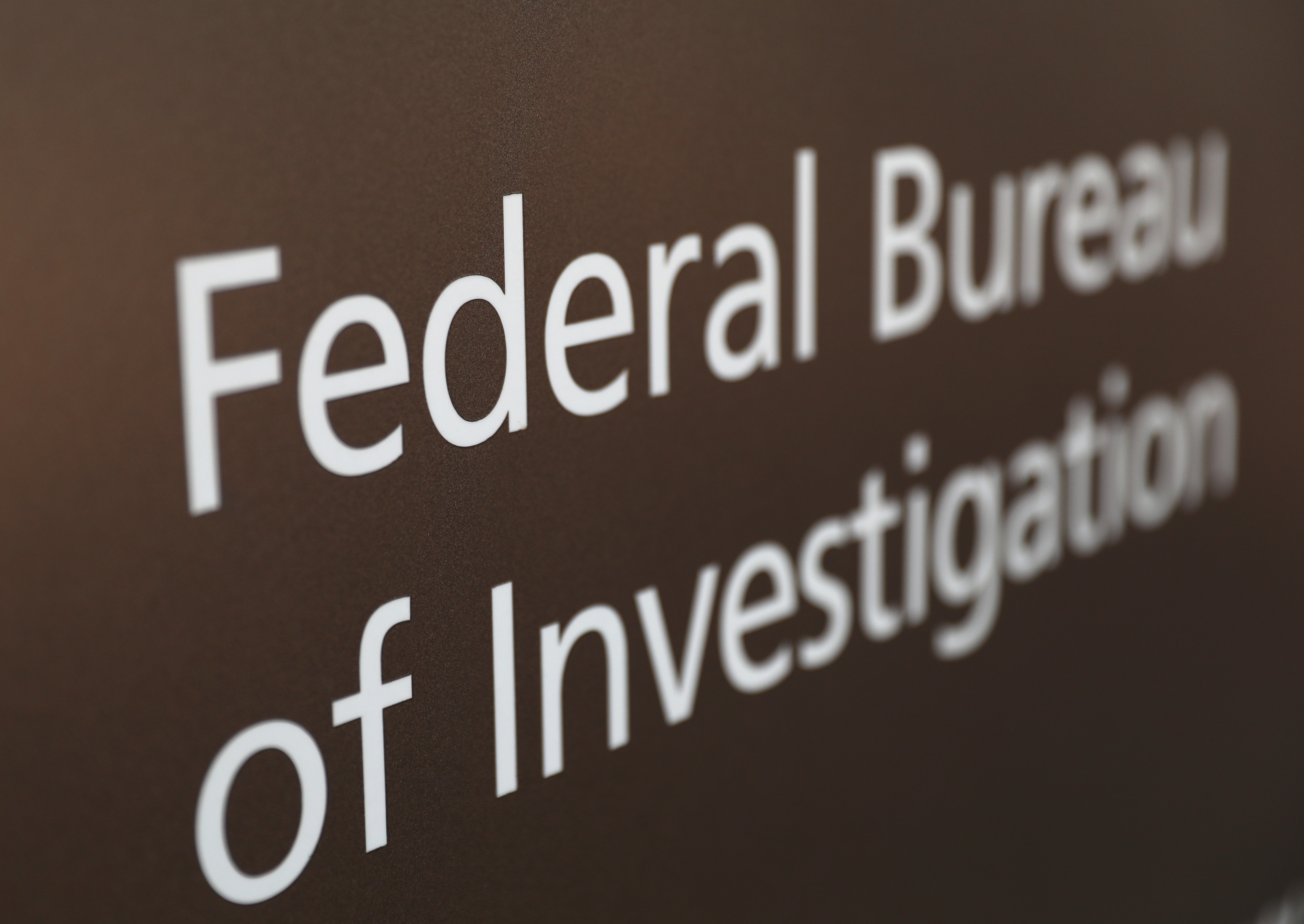 A sign of the FBI is seen outside of the J. Edgar Hoover FBI Building in Washington