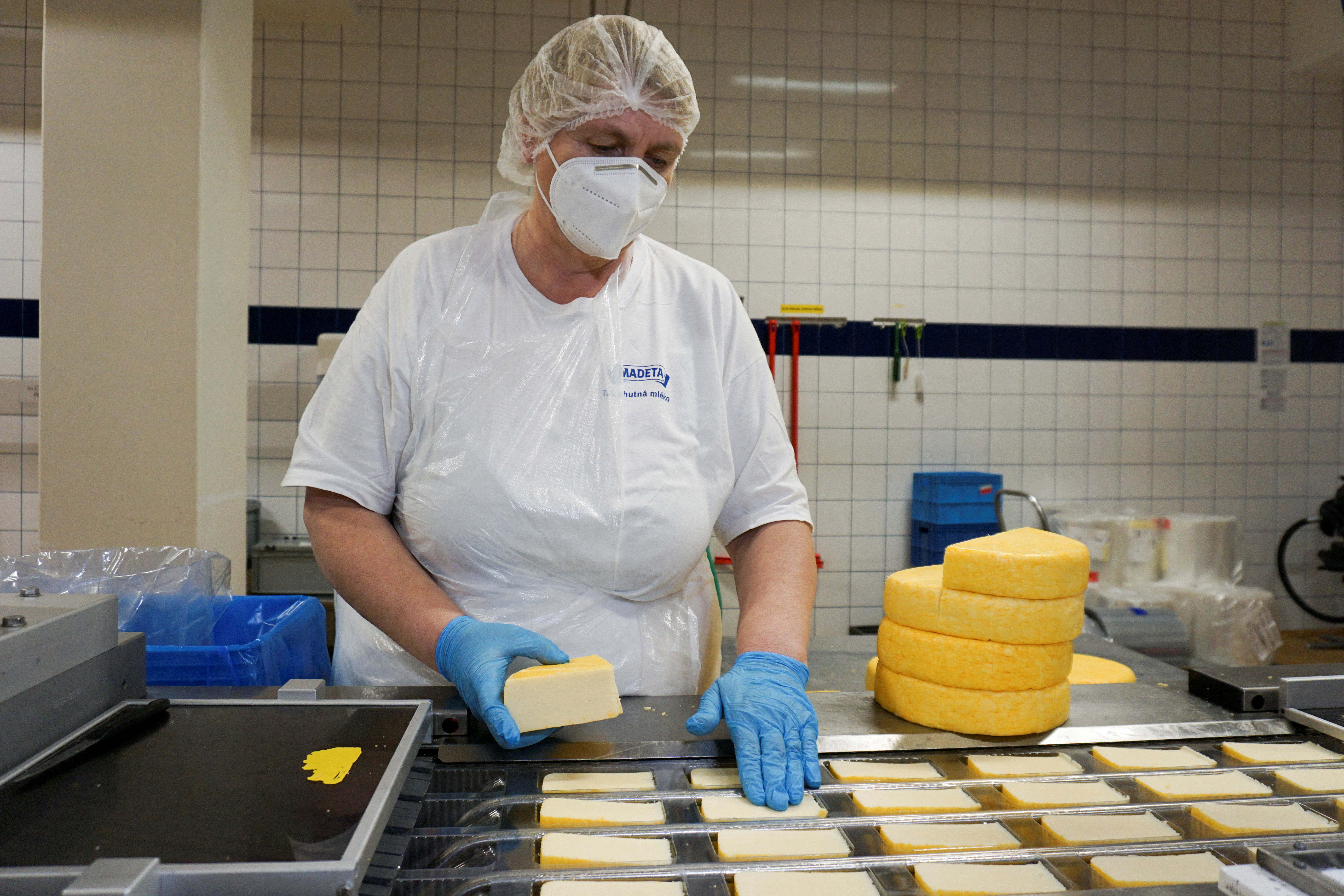 An employee works at Madeta dairy factory in Plana nad Luznici