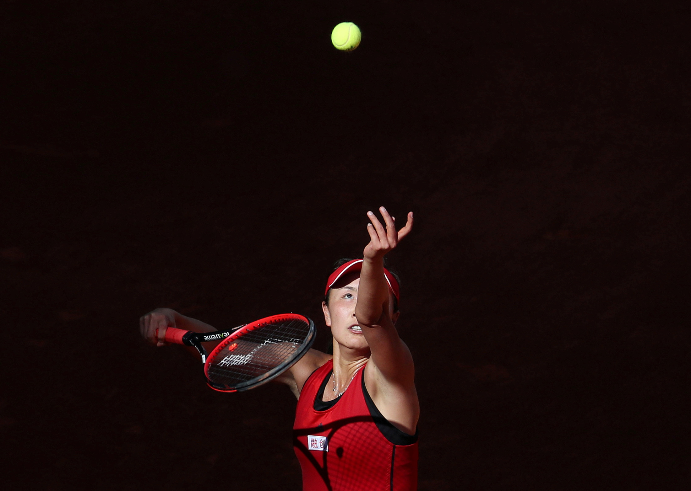 Tennis - WTA Mandatory - Madrid Open - Madrid, Spain - May 6, 2018   China's Peng Shuai in action against Spain's Garbine Muguruza during their round of 64 match   REUTERS/Susana Vera/File Photo