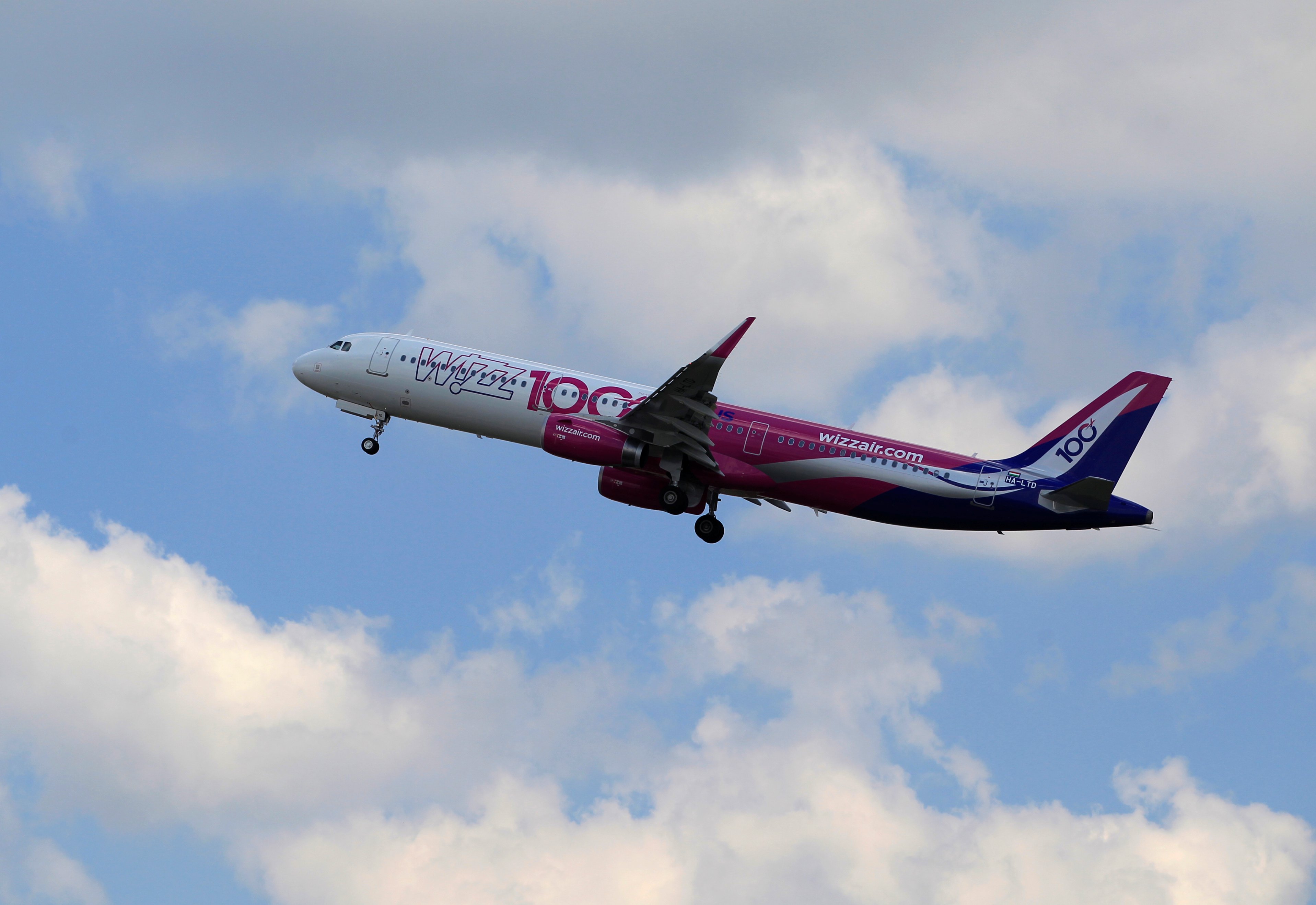 A Wizz Air Airbus A321 aircraft takes off after the unveiling ceremony of the 100th plane of its fleet at Budapest Airport