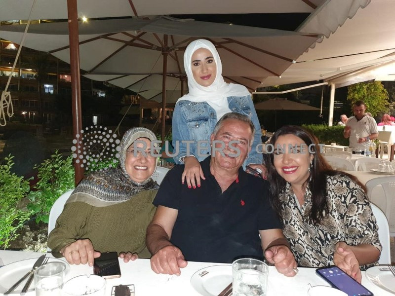 Liliane Cheaito is pictured with her family members in this undated handout said to be taken before the August 2020 Beirut port blast and obtained by Reuters from her family in Lebanon