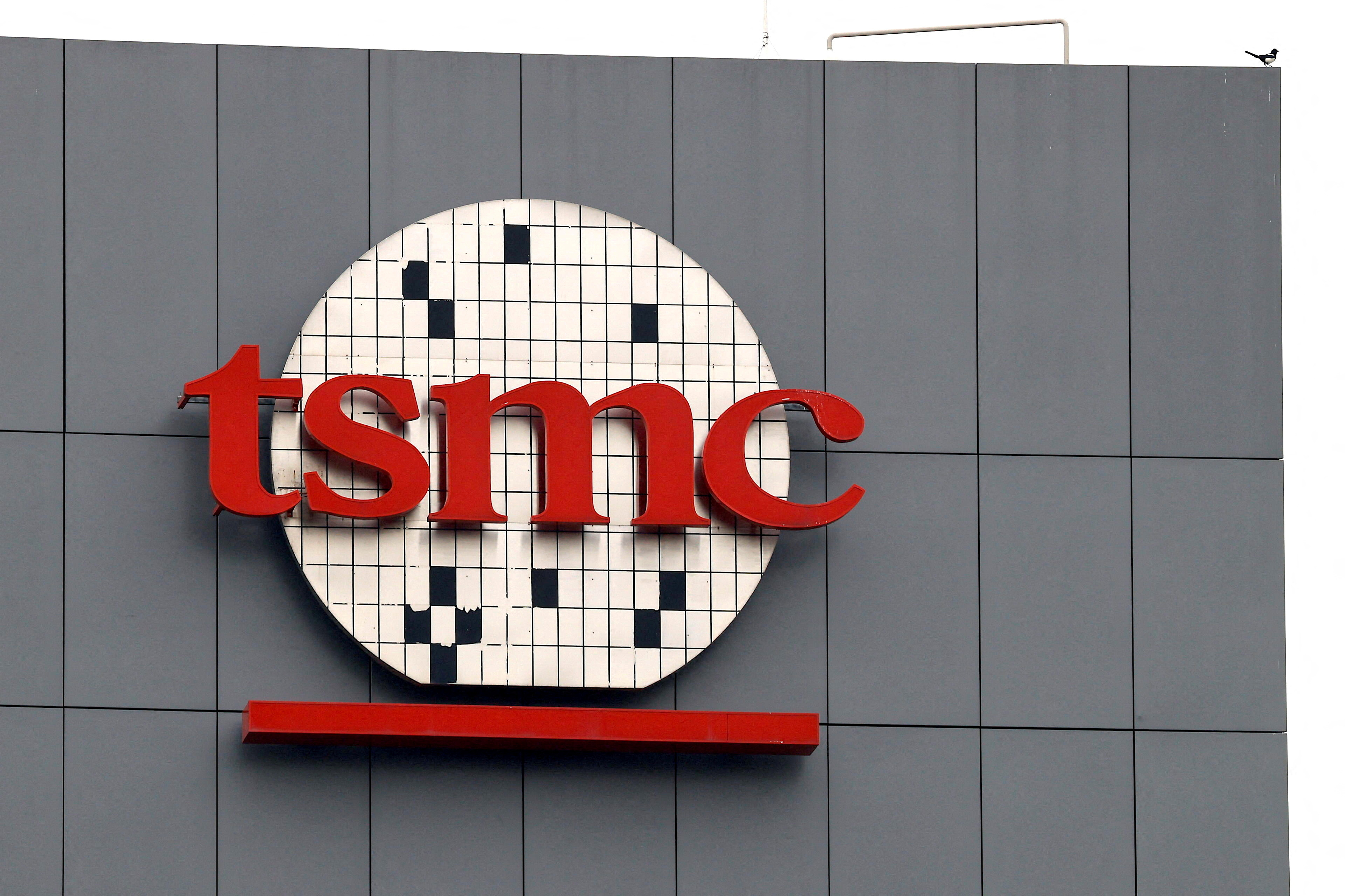 A logo of Taiwanese chip giant TSMC can be seen in Tainan