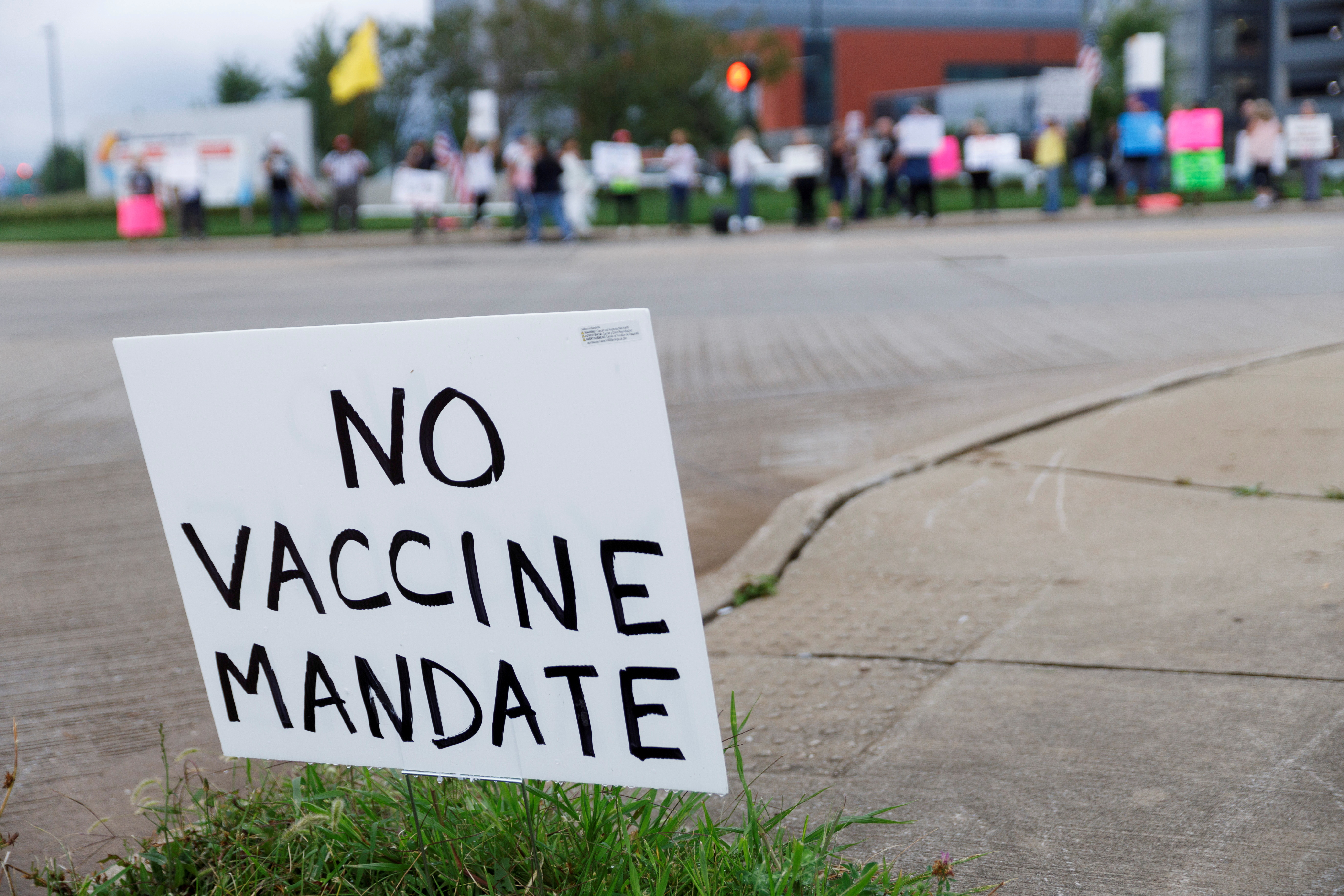 People protest vaccine mandates at Summa Health Hospital in Ohio