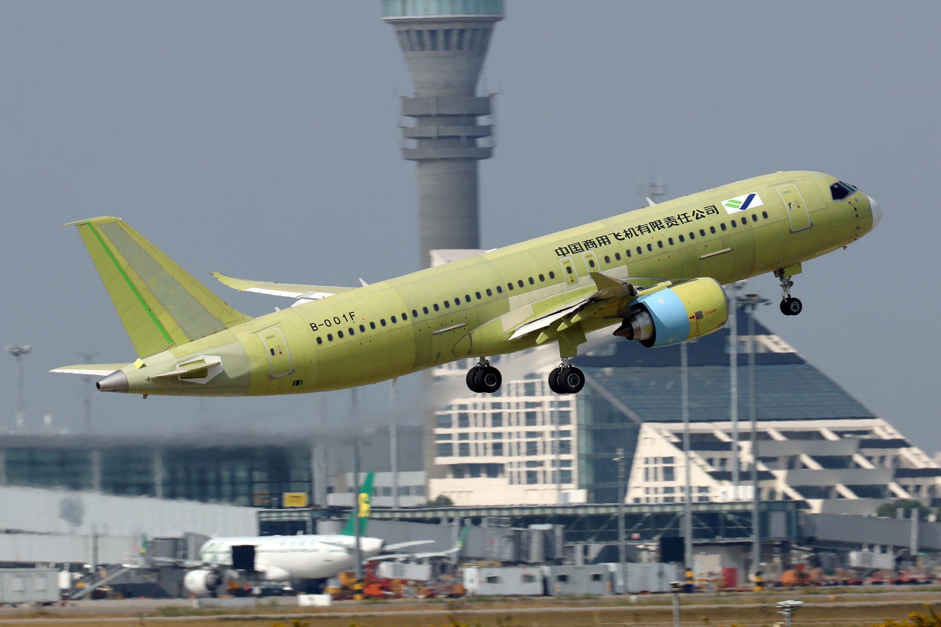 The fifth prototype of China's home-built C919 passenger plane takes off for its first test flight from Shanghai Pudong International Airport in Shanghai