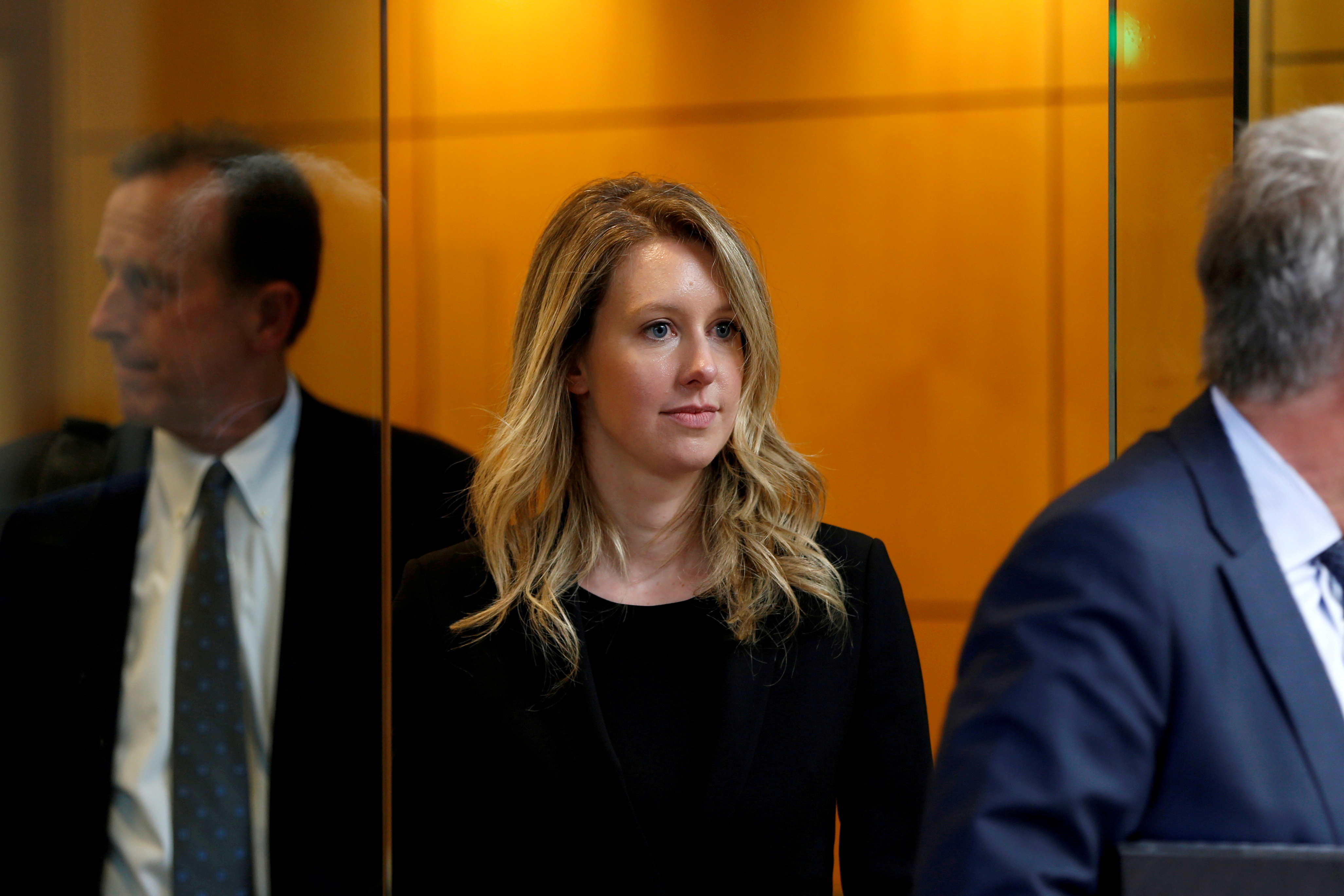Former Theranos CEO Elizabeth Holmes leaves after a hearing at a federal court in San Jose, California, July 17, U.S., 2019.  REUTERS/Stephen Lam