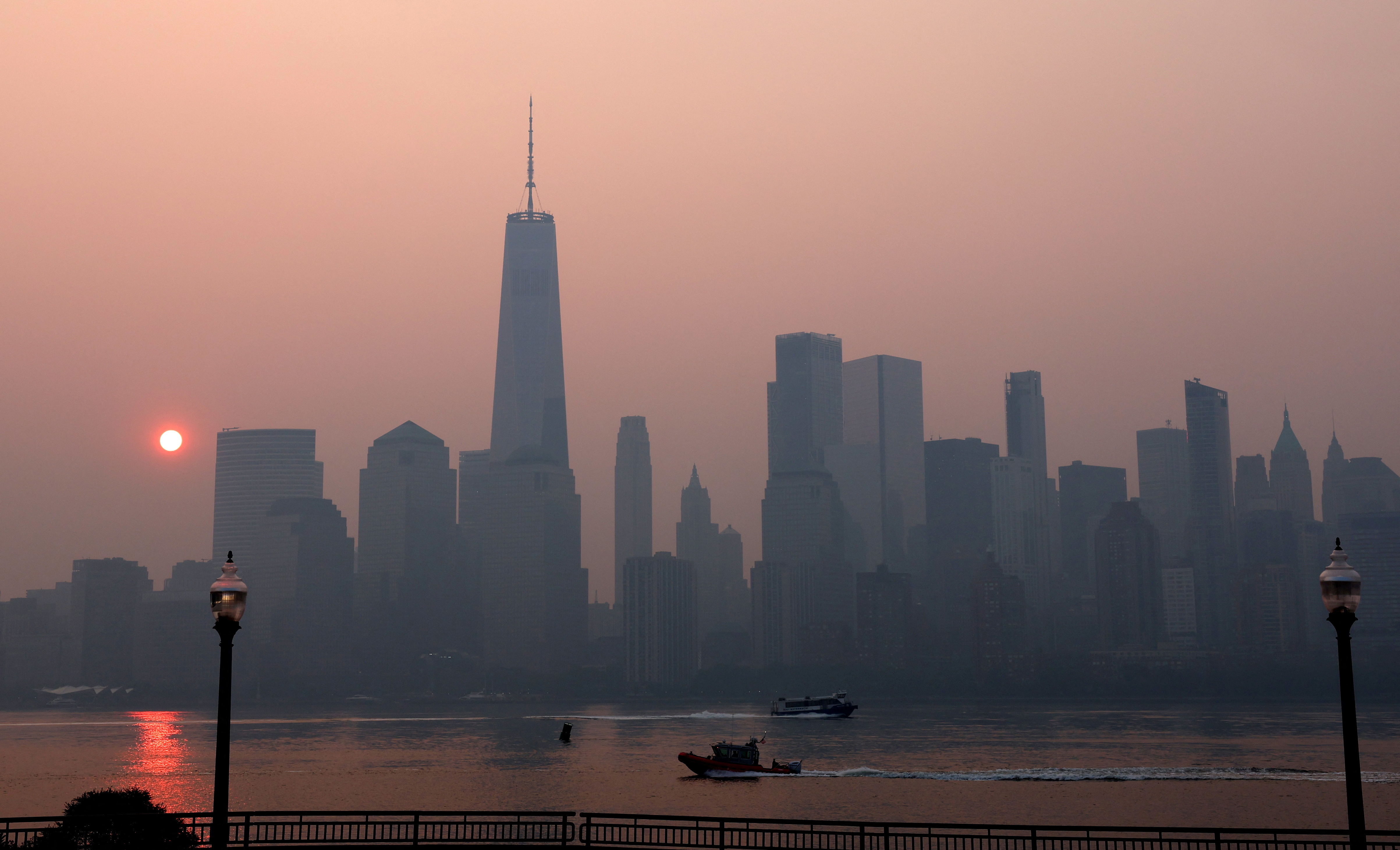 Haze and smoke shrouds Manhattan skyline from Canadian wildfires in New York