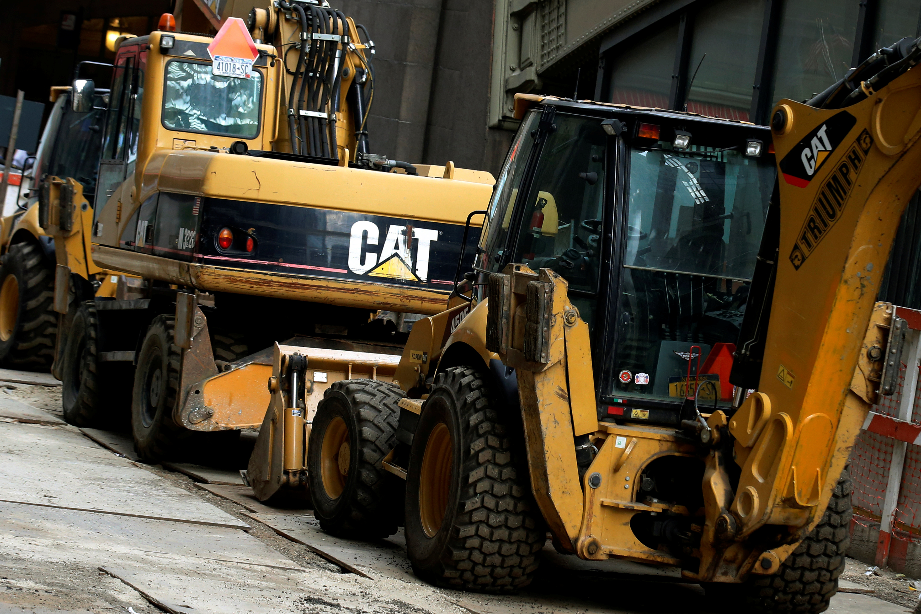 Caterpillar machines are seen at a construction site in New York