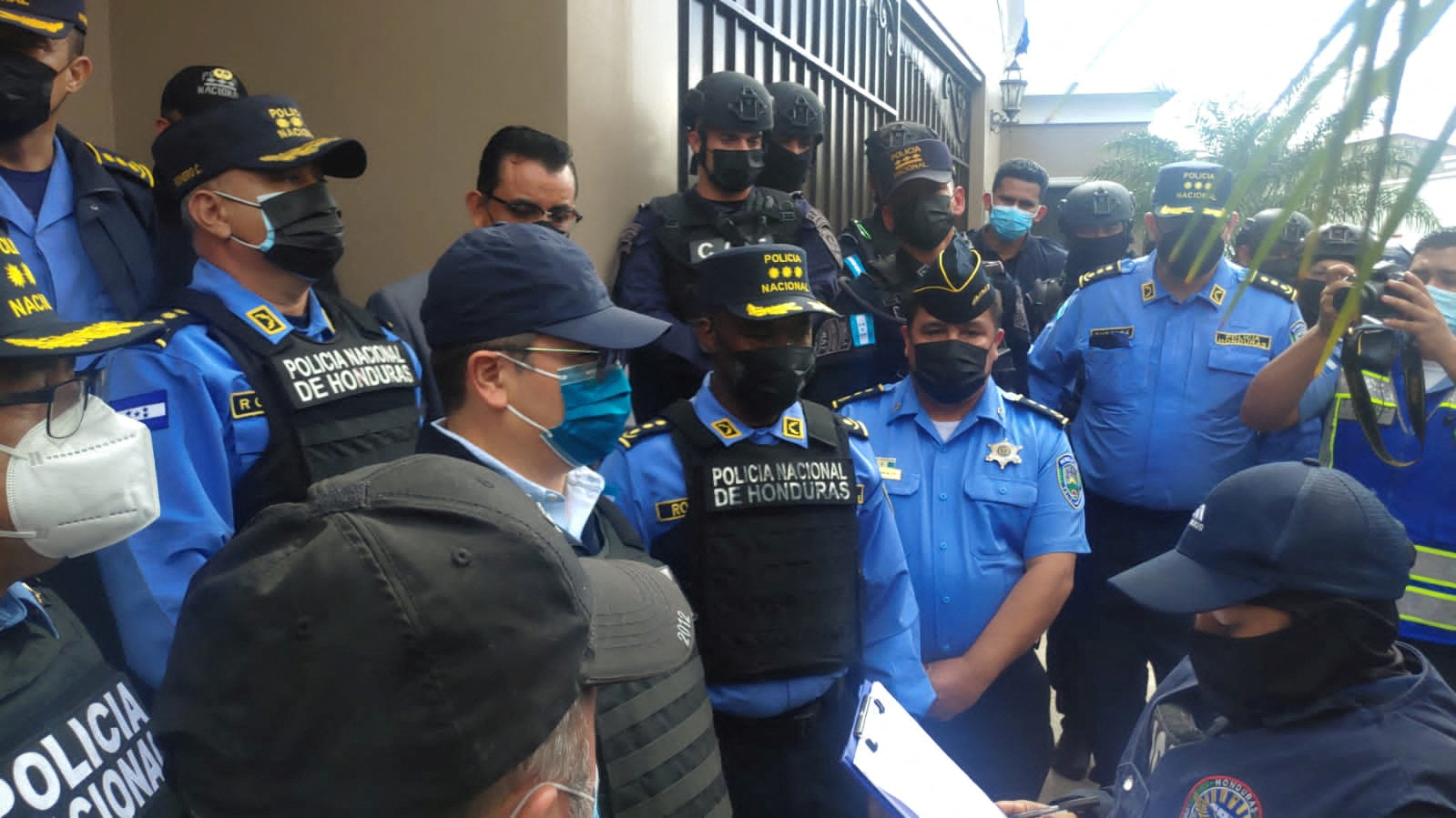 Former Honduras President Hernandez leaves home escorted by police