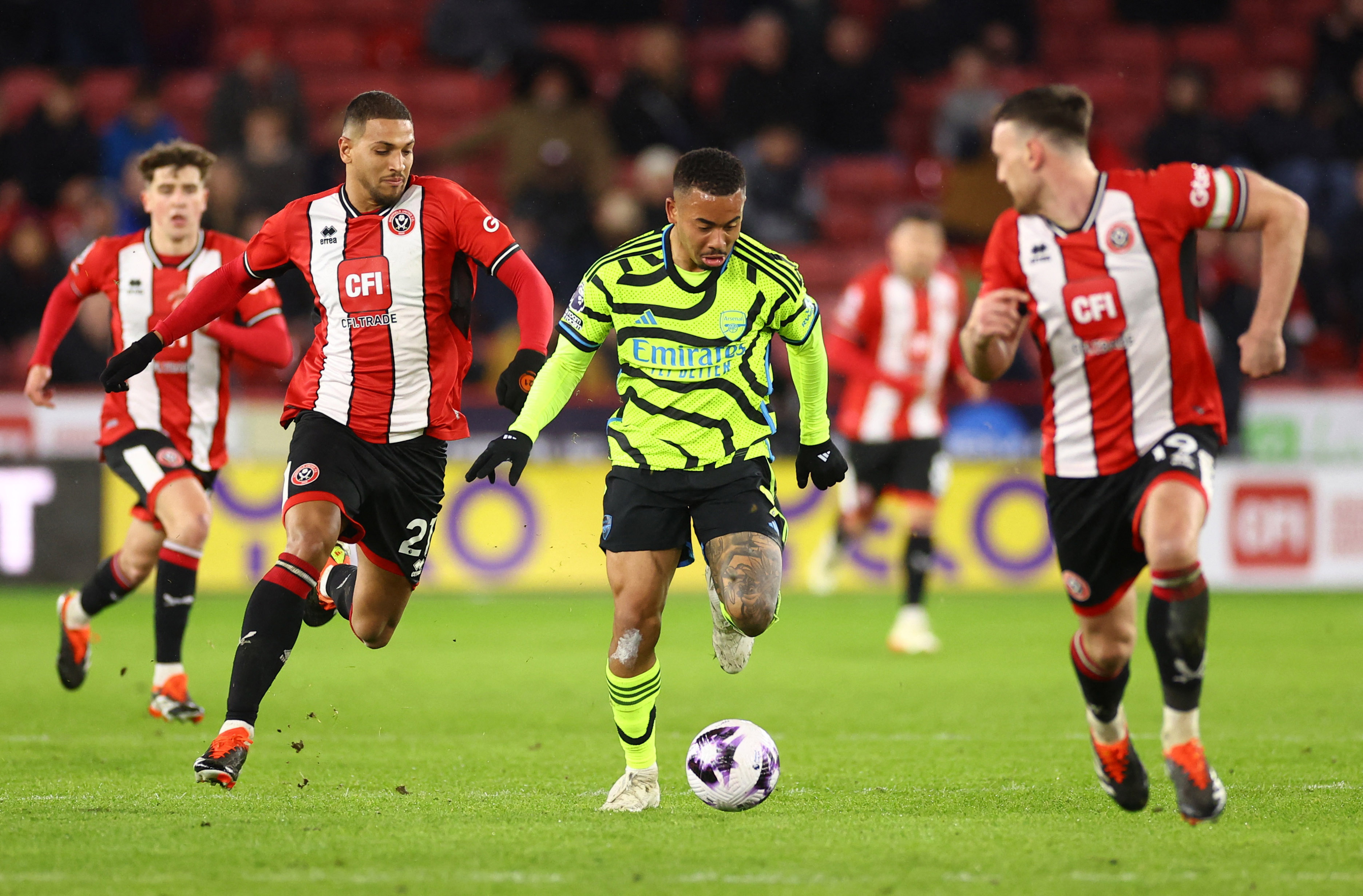 Soccer Football - Premier League - Sheffield United v Arsenal - Bramall Lane, Sheffield, Britain - March 4, 2024 Arsenal's Gabriel Jesus in action with Sheffield United's Vinicius Souza and Jack Robinson REUTERS/Carl Recine