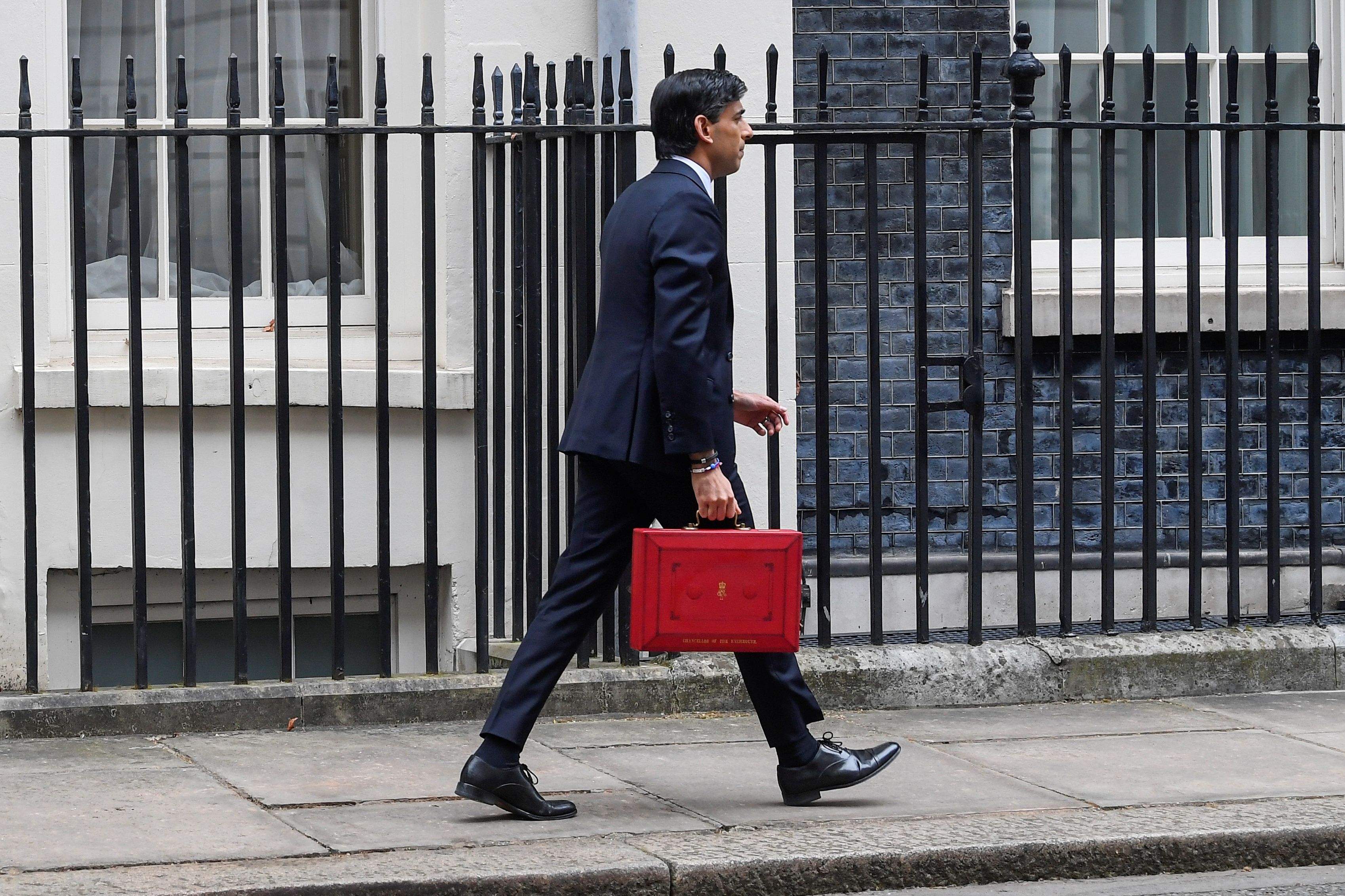 Britain's Chancellor of the Exchequer Sunak carries the the budget box in London