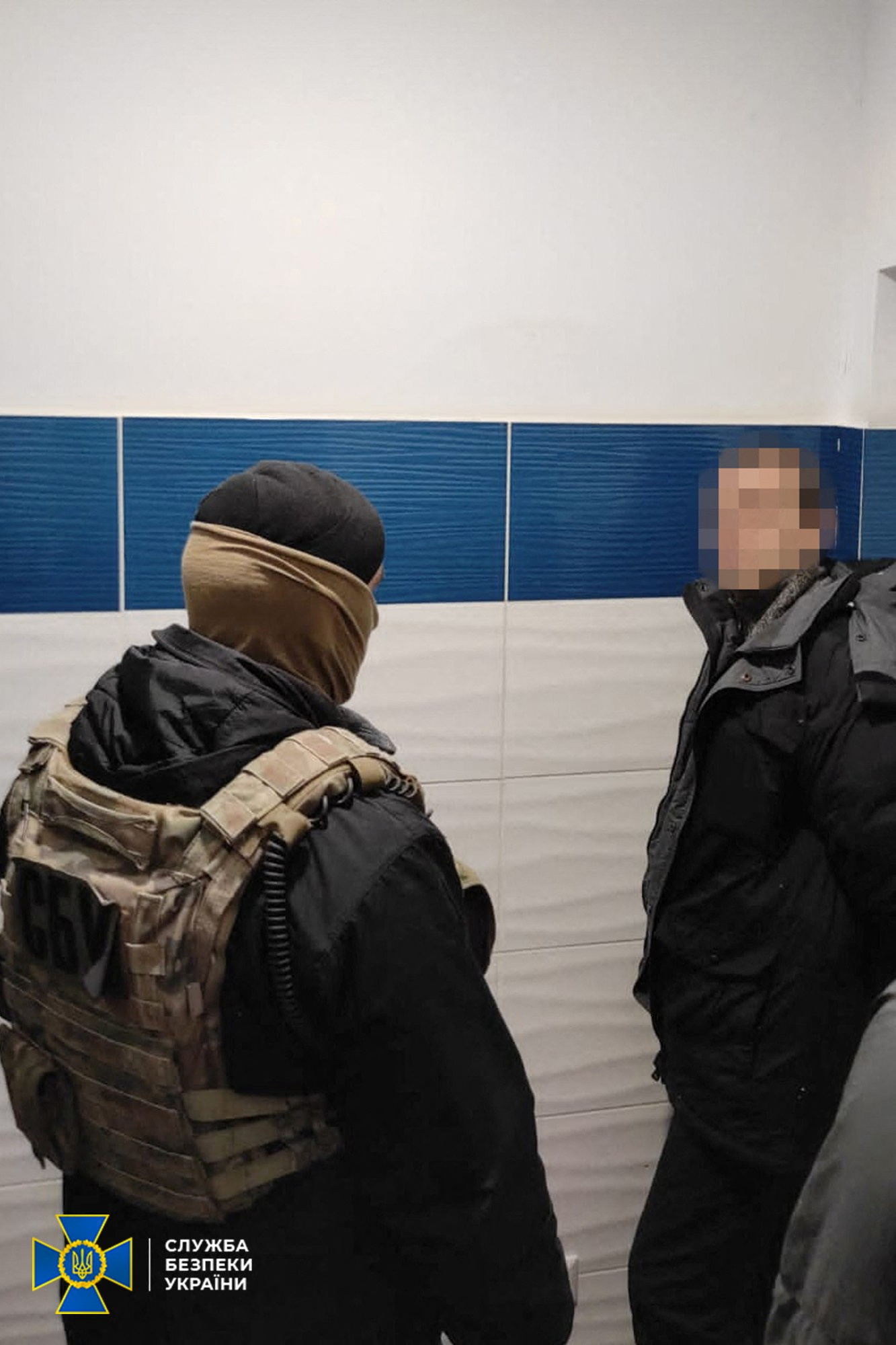 A man who, according to the State Security Service of Ukraine, is a Russian military intelligence agent, is detained in an unknown location