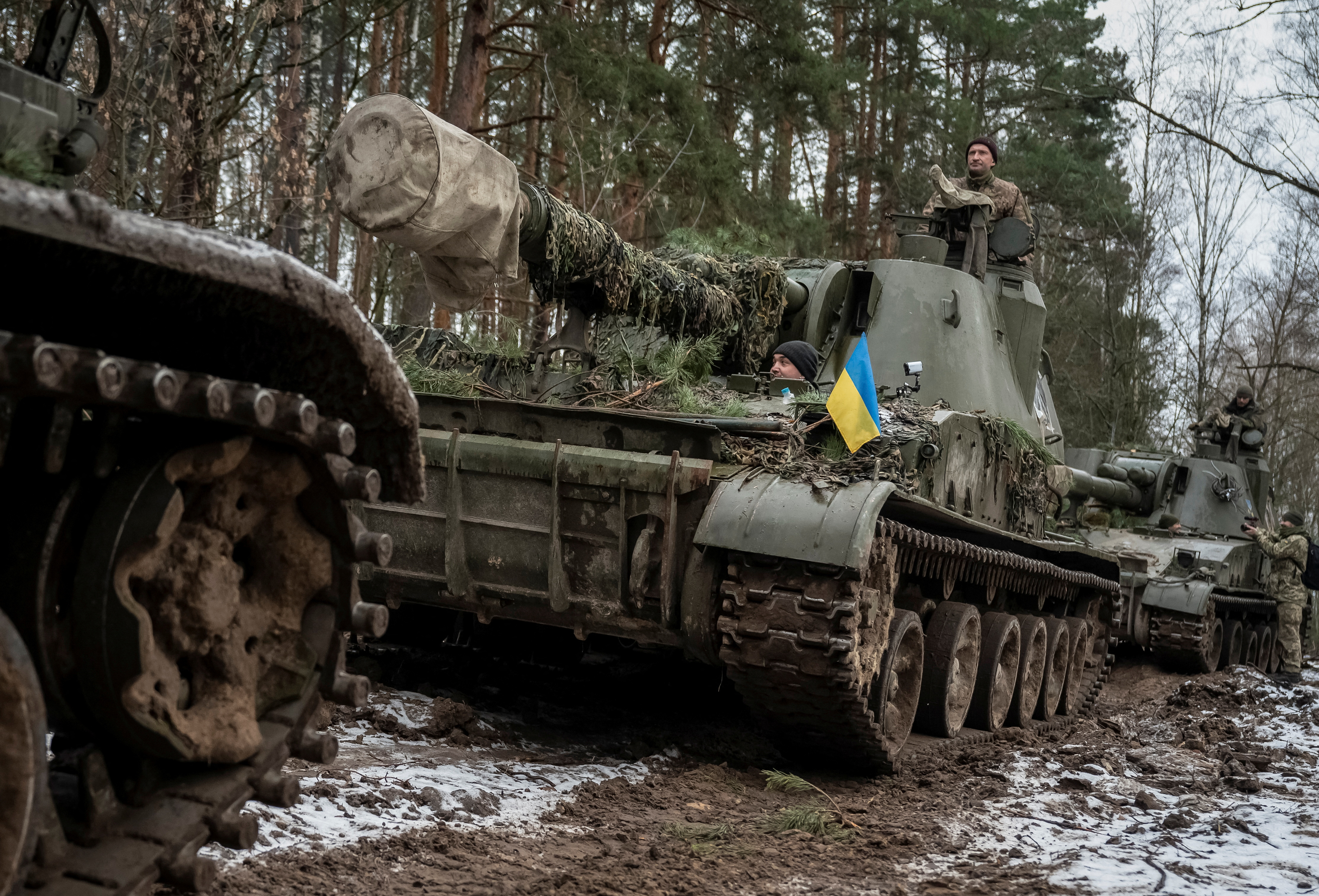 Ukrainian servicemen attend a drill of armed forces at the border with Belarus near Chornobyl