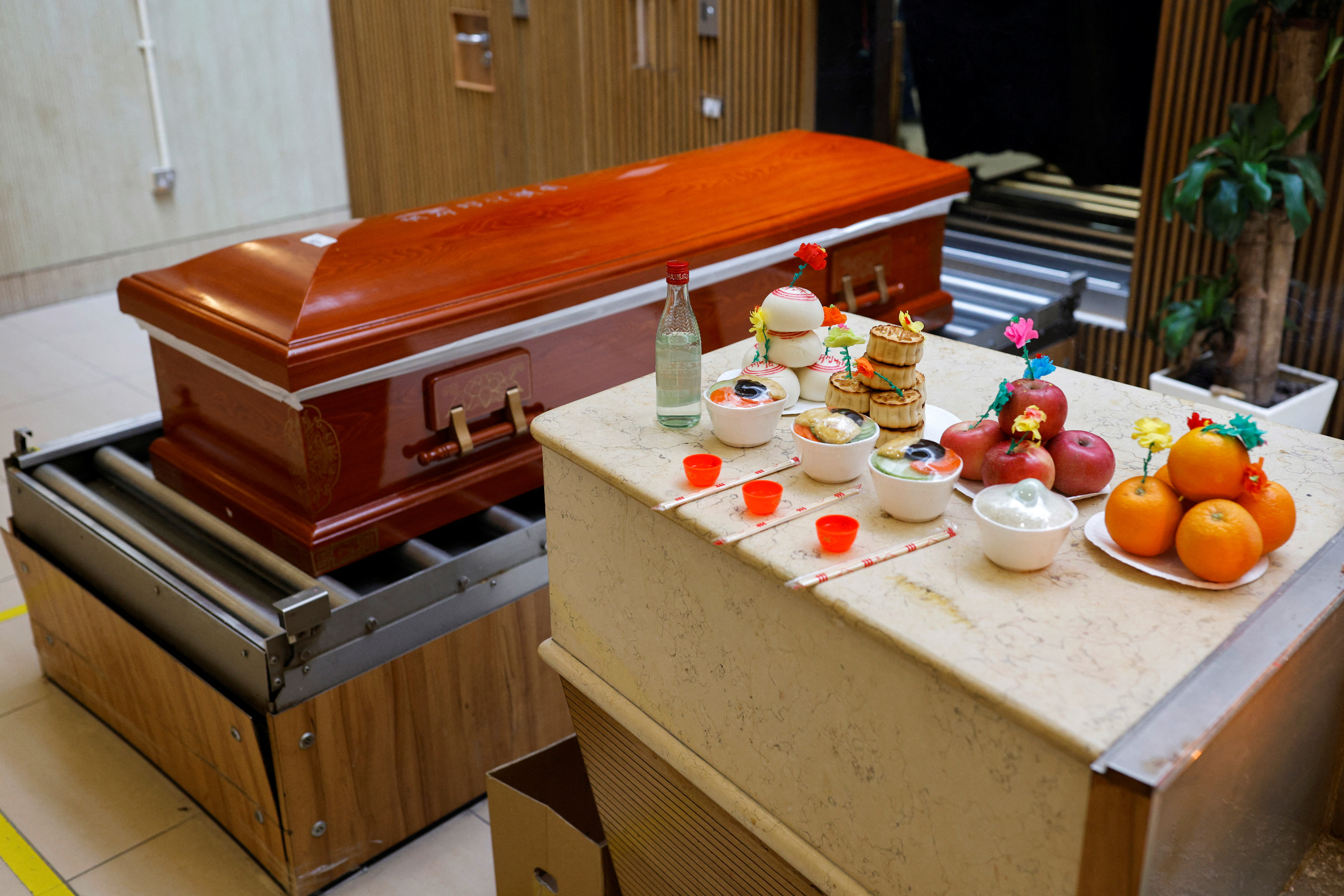 So many bodies piled up': Hong Kong funeral services overwhelmed by COVID Reuters