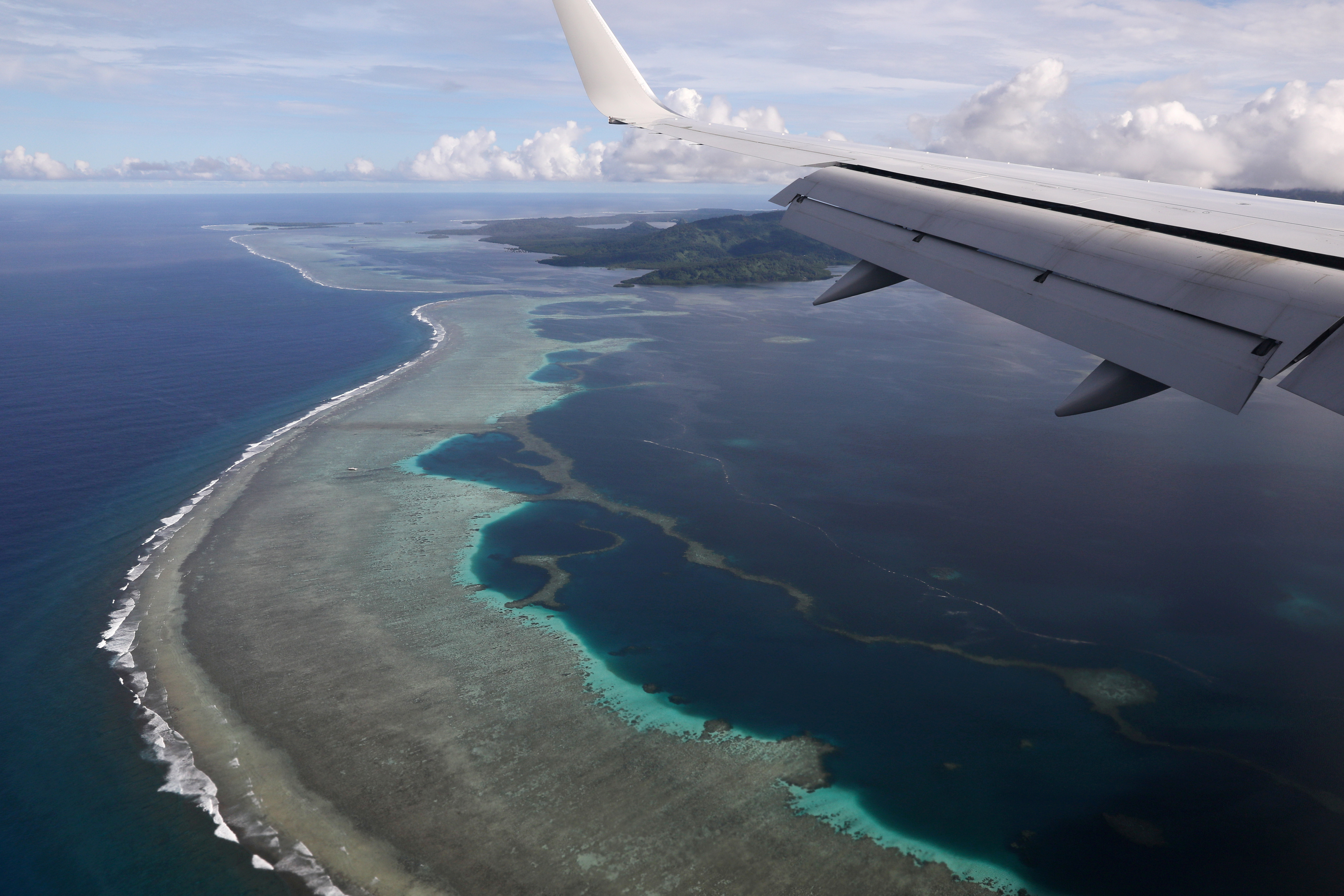 FILE PHOTO: U.S. Secretary of State Pompeo's plane makes its landing approach on Pohnpei International Airport in Kolonia, Federated States of Micronesia