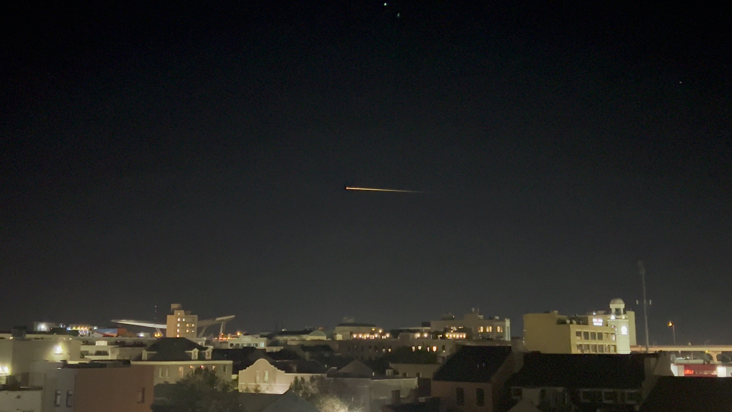 SpaceX Crew-2 streaks across the sky as it makes its return to Earth, in New Orleans, Louisianna