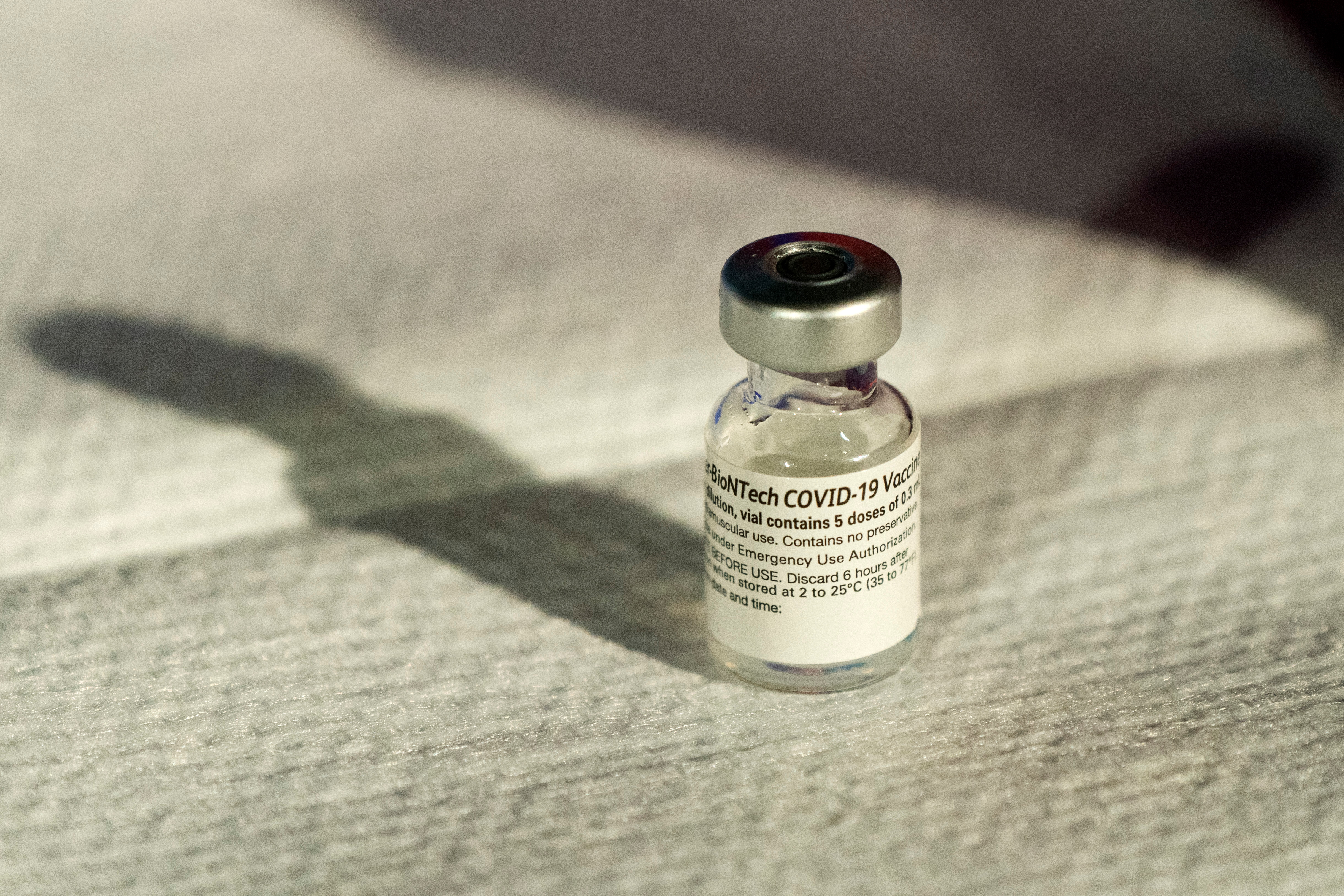 A vial of Pfizer's COVID-19 vaccine that received emergency use authorization is seen at George Washington University Hospital in Washington, D.C., U.S. December 14, 2020. Jacquelyn Martin/Pool via REUTERS