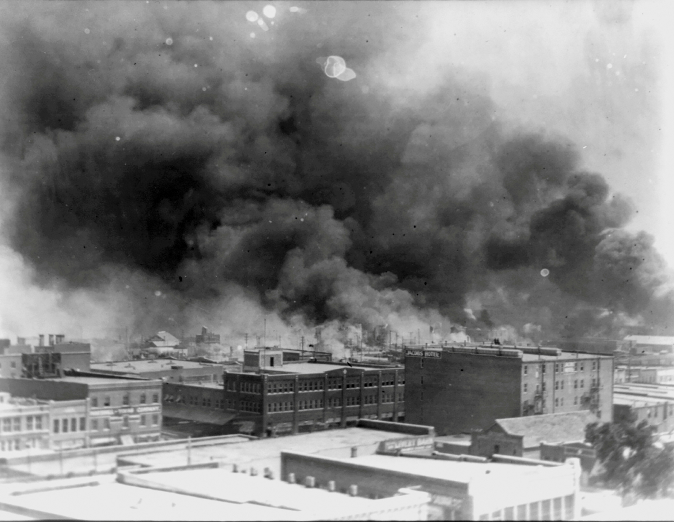 Three exhumed 1921 Tulsa massacre victims found to have gunshot wounds ...