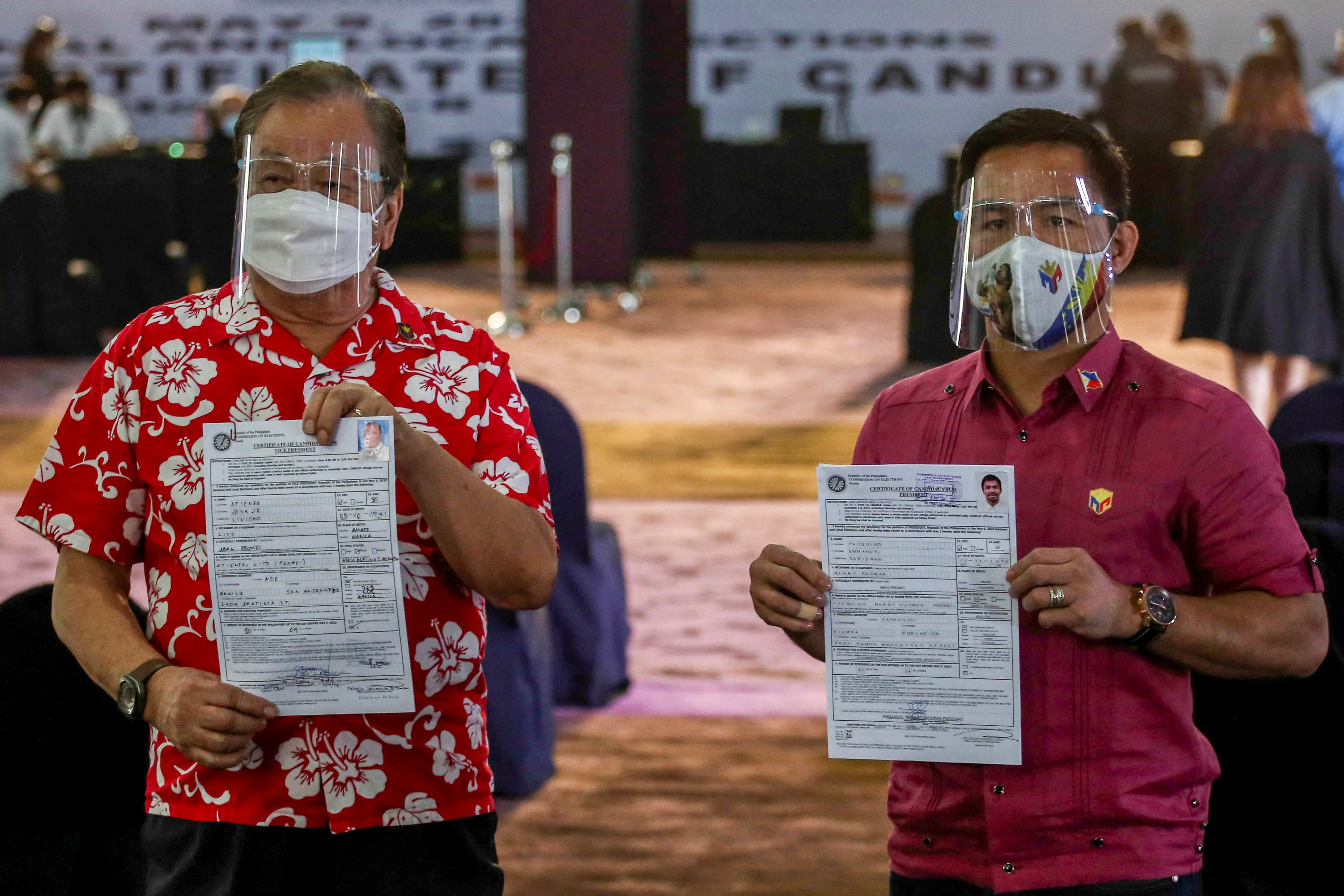Philippine senator and newly retired boxing icon Manny Pacquiao, and former Manila Mayor Lito Atienza file their certificate of candidacy as president and vice president at Sofitel Harbor Garden Tent, in Pasay City, Metro Manila, Philippines, October 1, 2021. Jam Sta Rosa/Pool via REUTERS