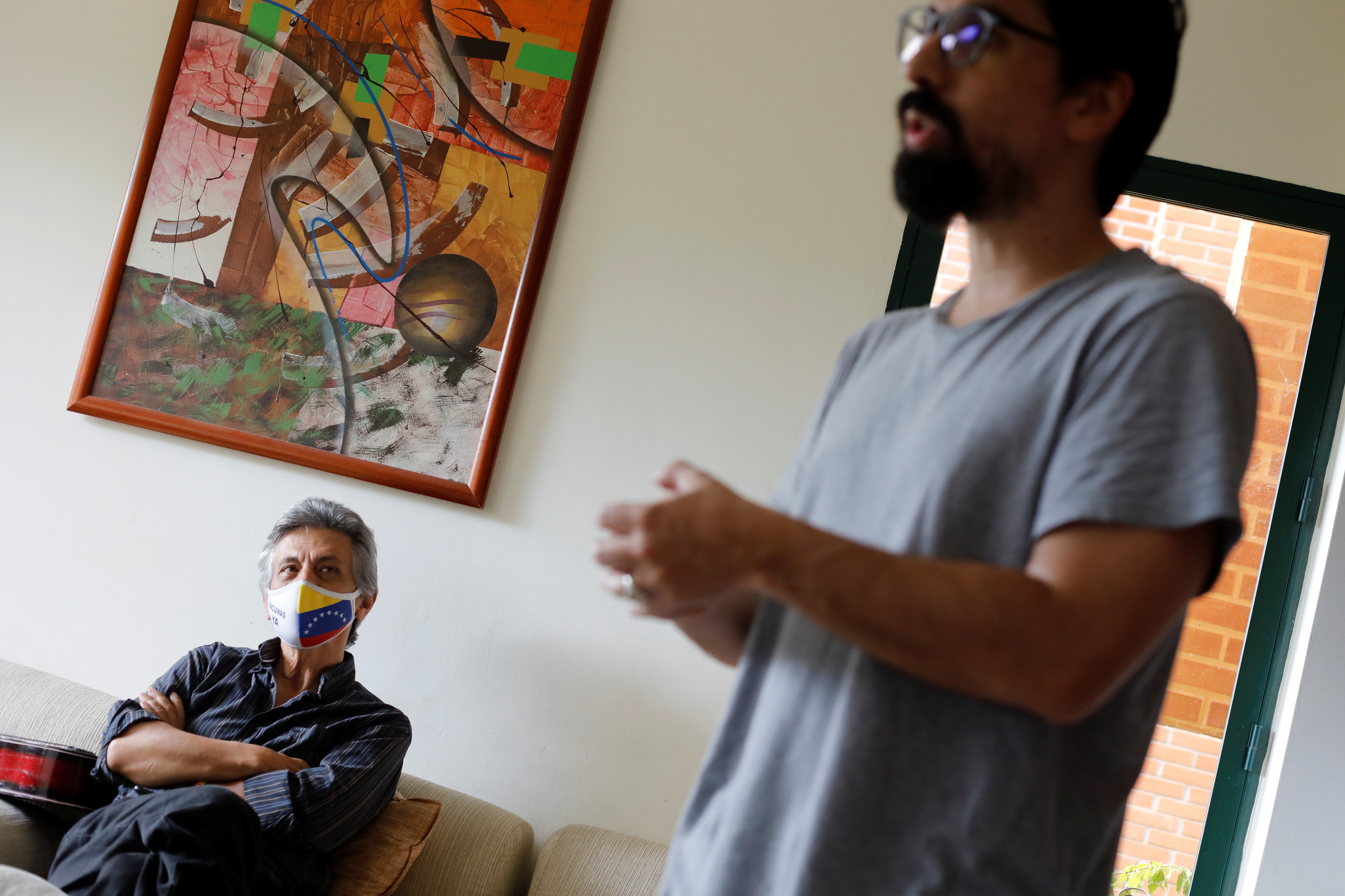 Freddy Guevara, father of Venezuelan opposition leader Freddy Guevara, looks at his son as he talks to Reuters, in Caracas