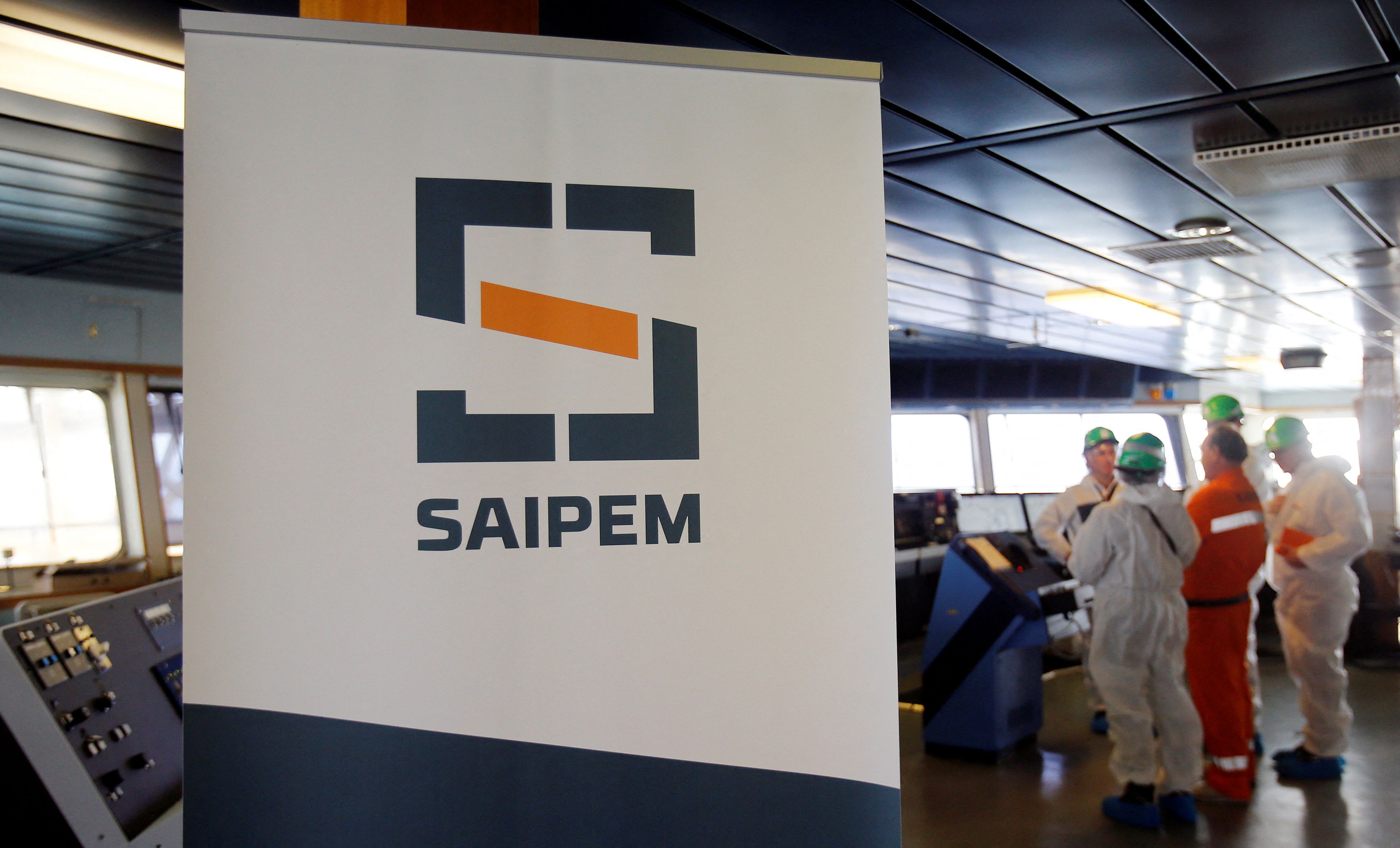 A Saipem logo in seen on the bridge of the Saipem 10000 deepwater drillship in Genoa's harbour