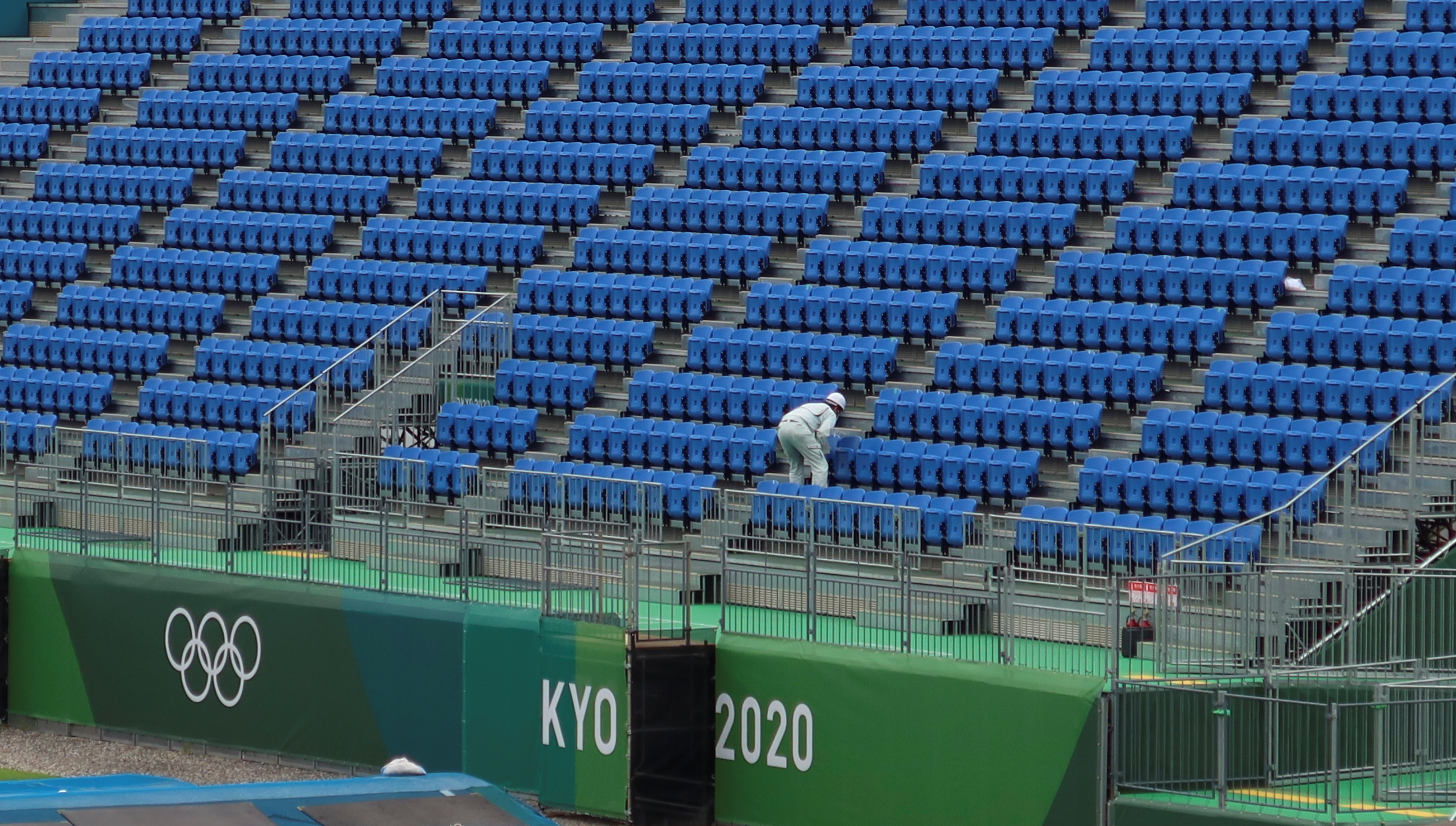A worker inspects seats at Tokyo2020 Olympic BMX Track in preparation for the Tokyo 2020 Olympic Games in Tokyo
