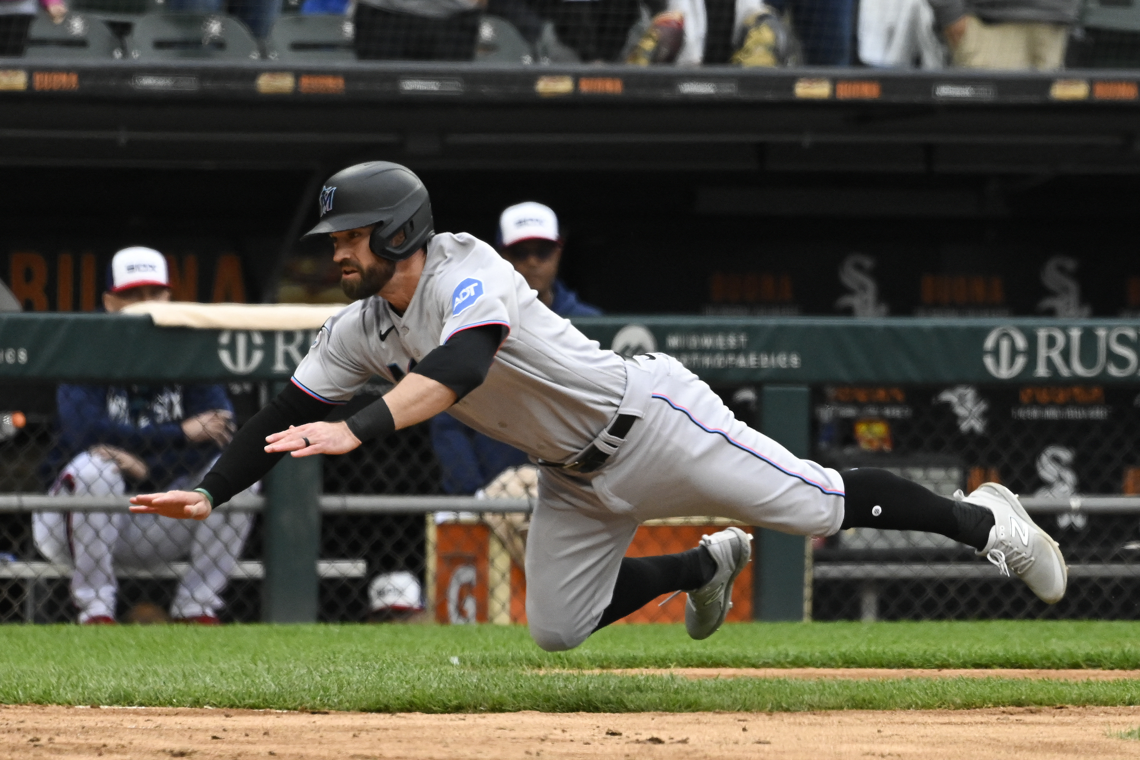 Marlins storm back with three-run ninth to topple White Sox