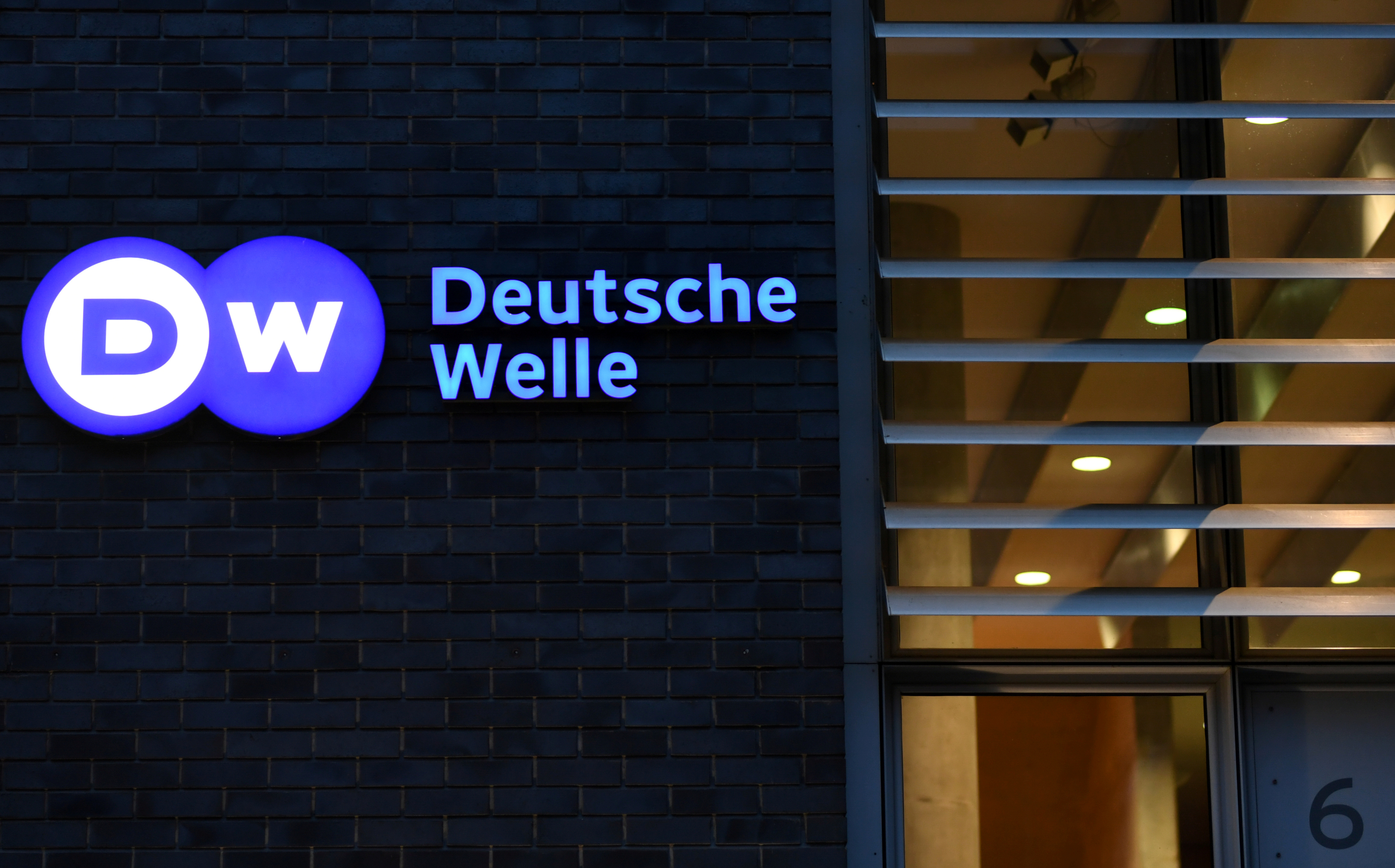 The logo of German international broadcaster Deutsche Welle is pictured in Berlin