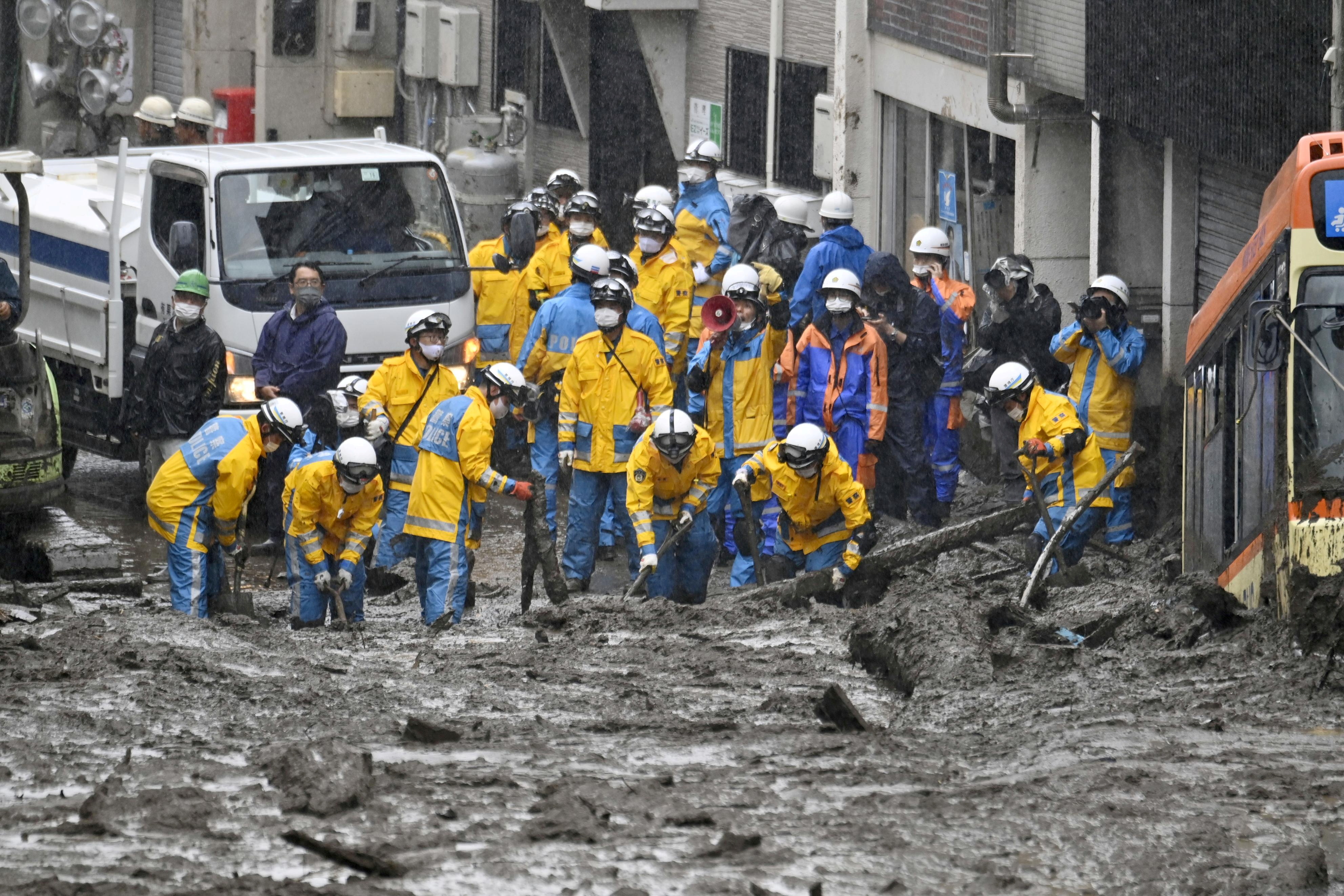 Japan rescue work continues after deadly landslides, 20 missing