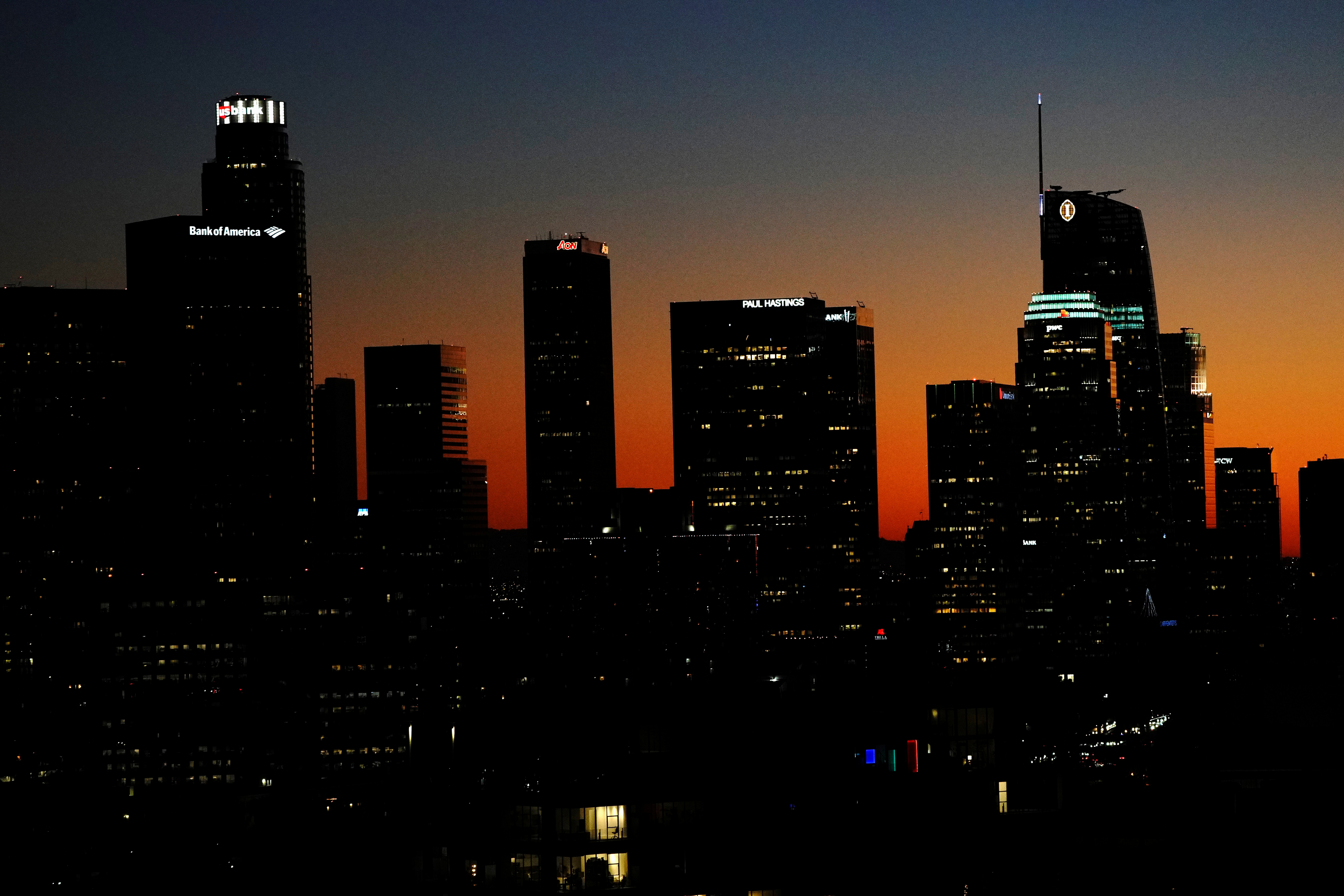 The Los Angeles city skyline is seen after sunset during a surge in positive coronavirus disease (COVID-19) cases in Los Angeles