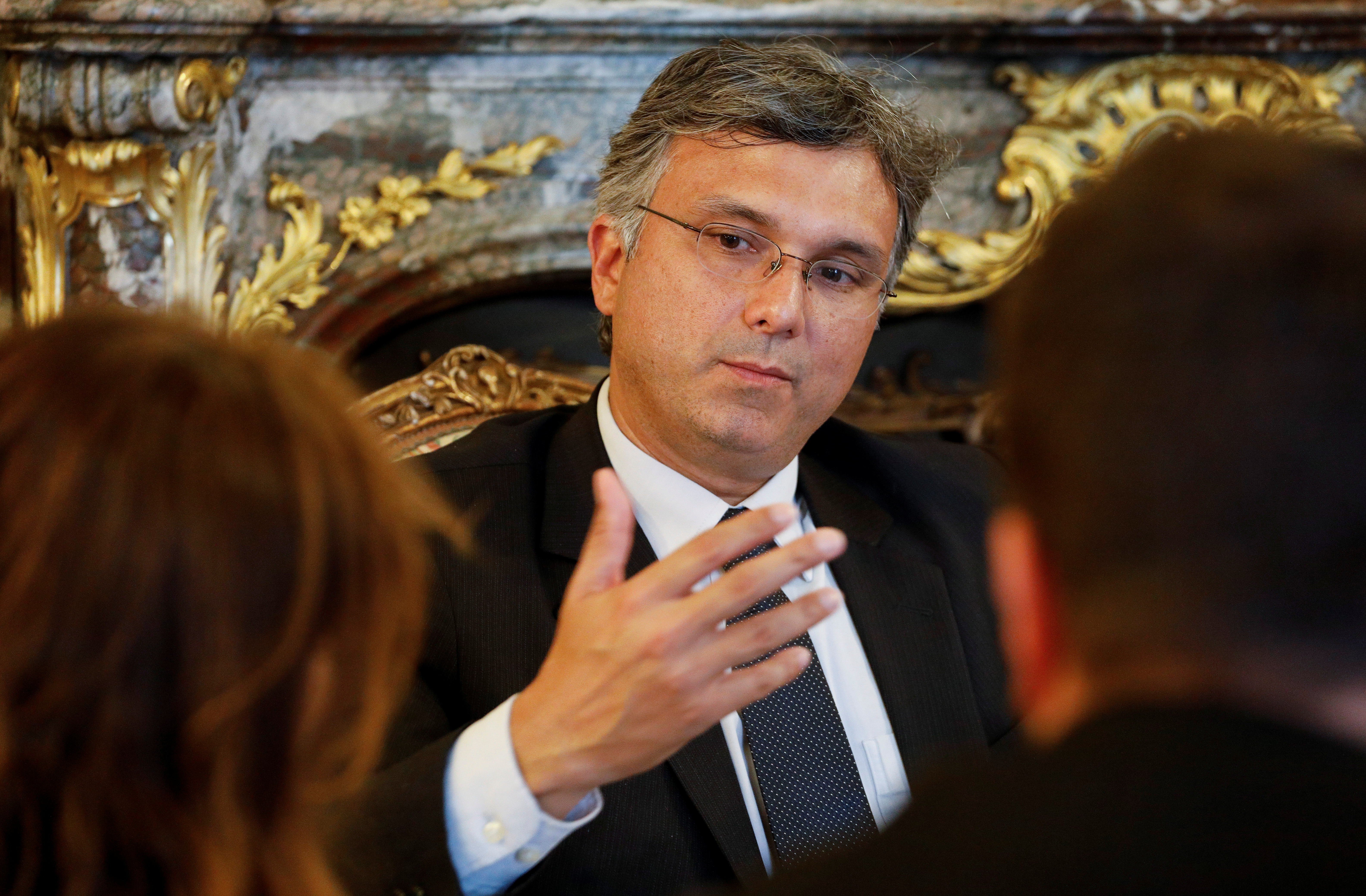 Brazil's Planning Minister Esteves Colnago gestures during an interview with Reuters at the Brazilian Embassy in Madrid