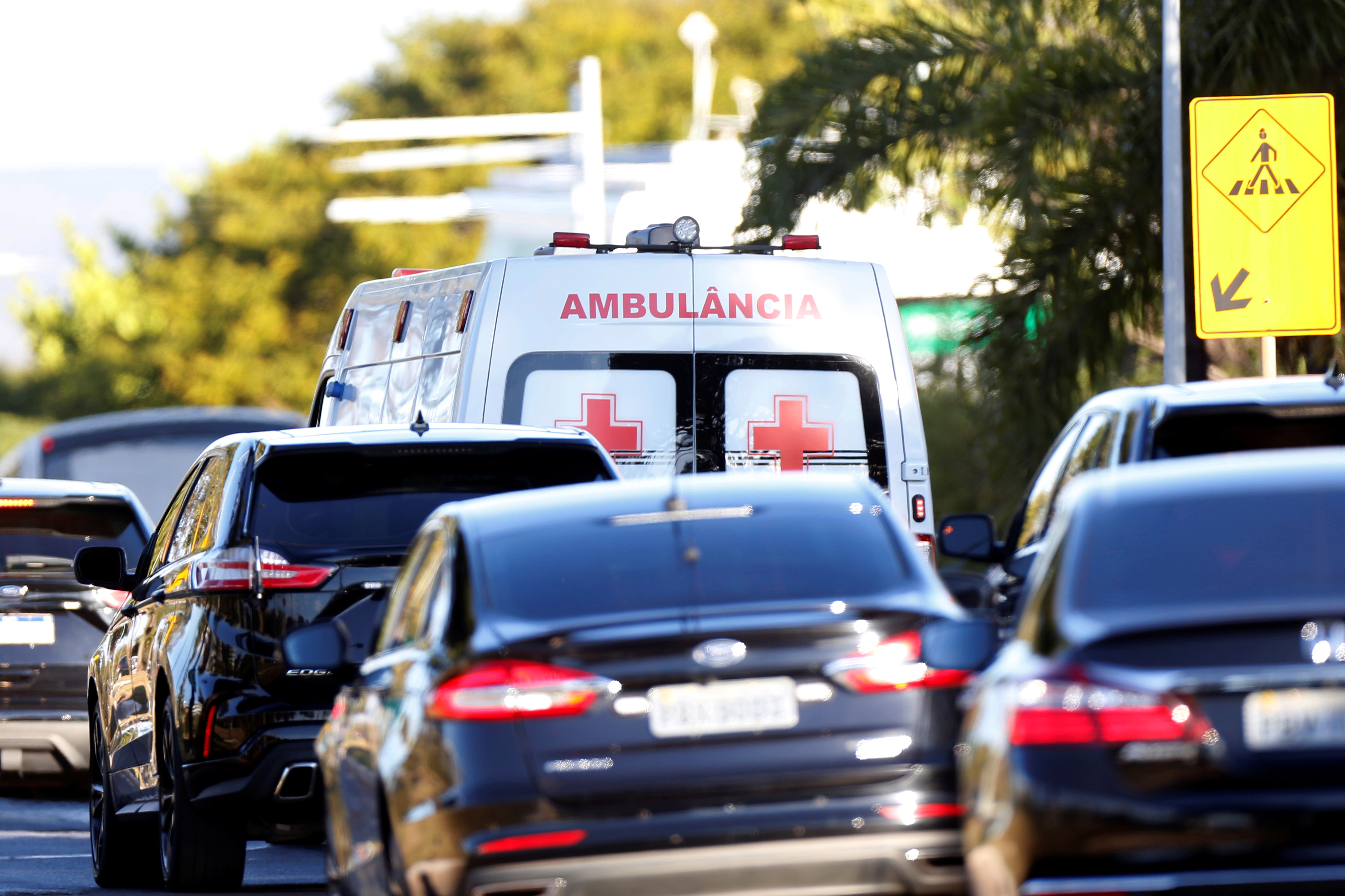 A presidential convoy with an ambulance transporting Brazil's President Jair Bolsonaro leaves the armed forces hospital (HFA) in Brasilia