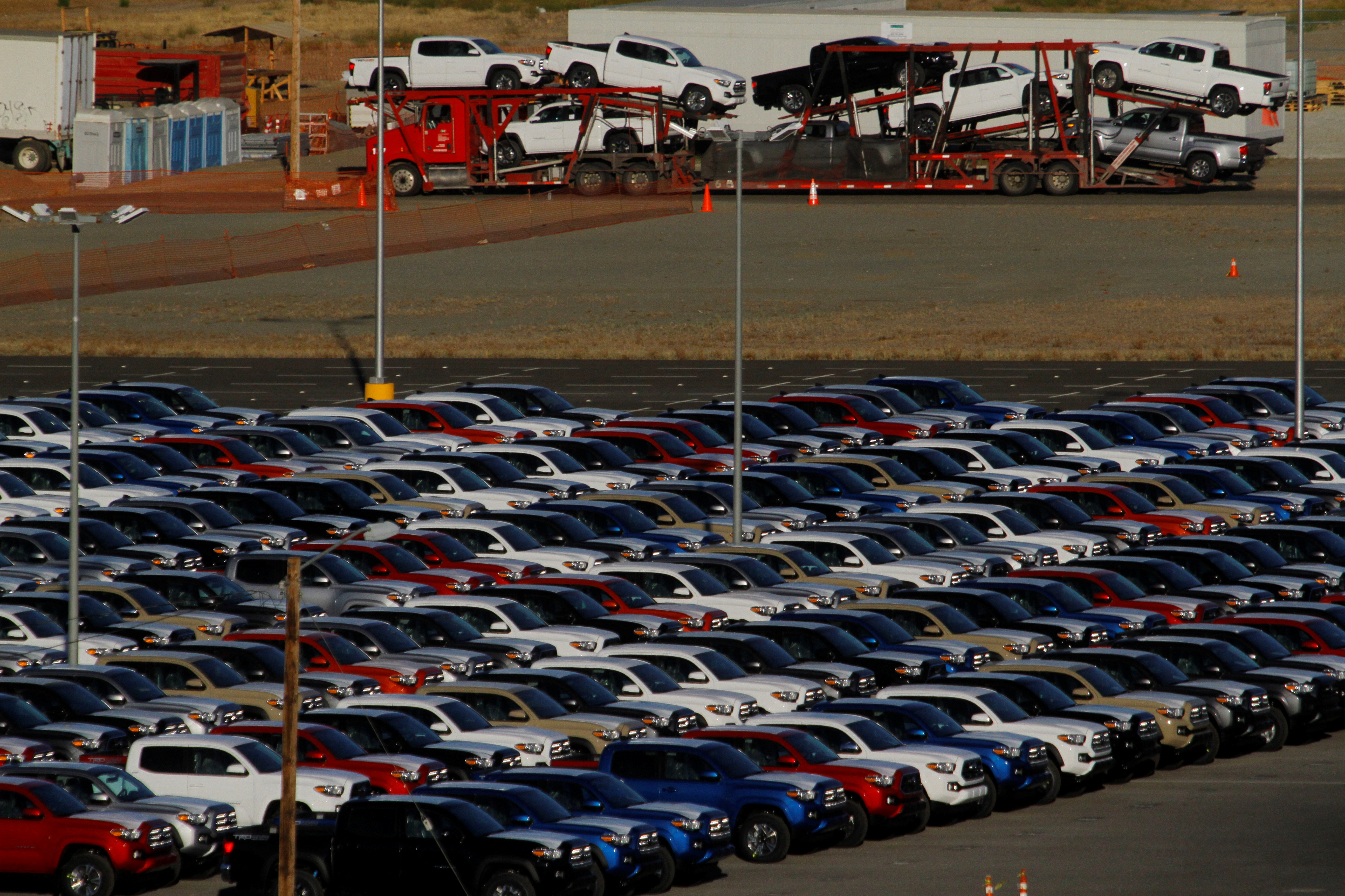 Newly assembled vehicles are seen at a stockyard of the automobile plant Toyota Motor Manufacturing of Baja California in Tijuana, Mexico