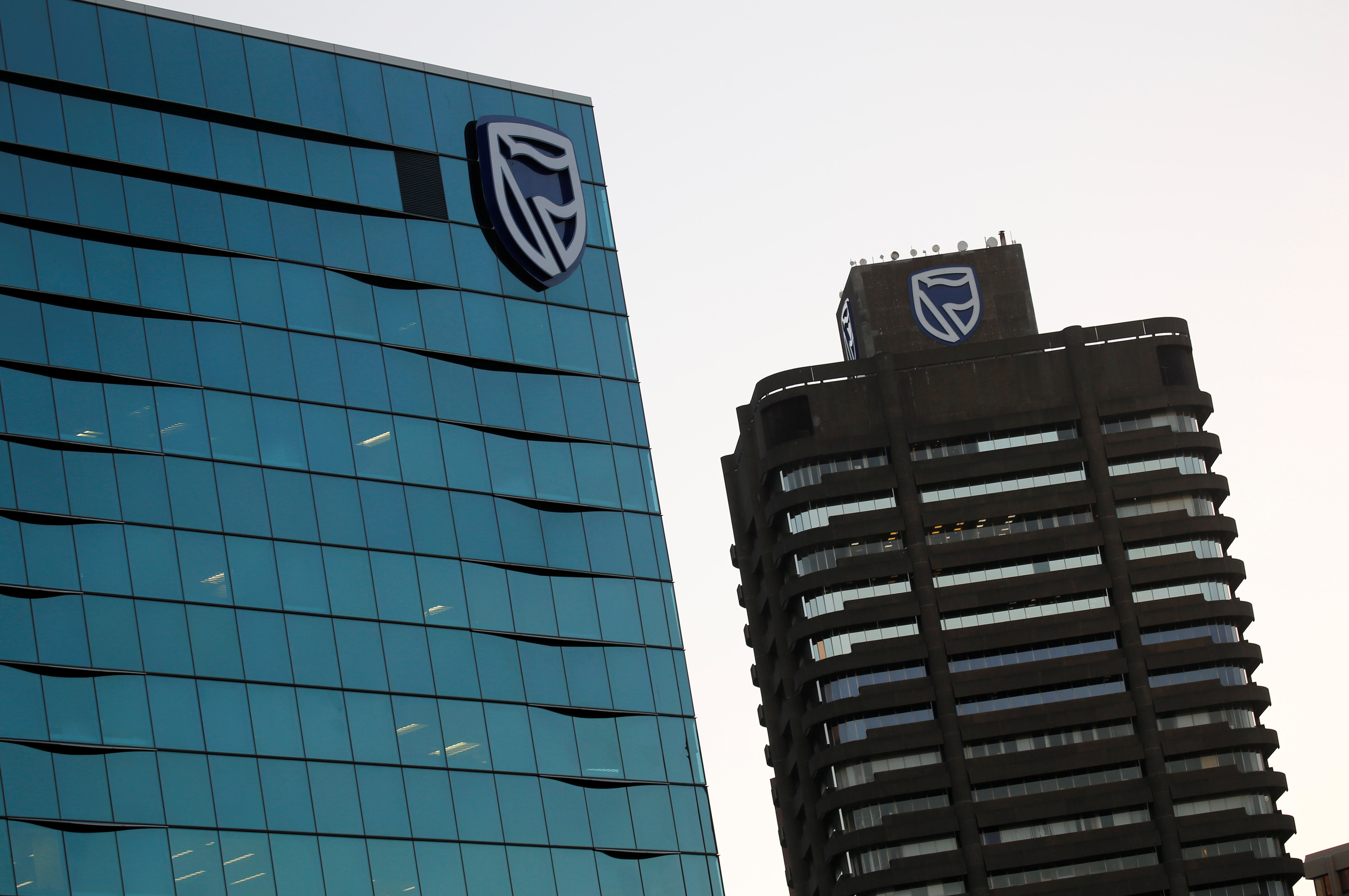 The logo of South Africa's Standard Bank is seen above the company's headquarters in Cape Town