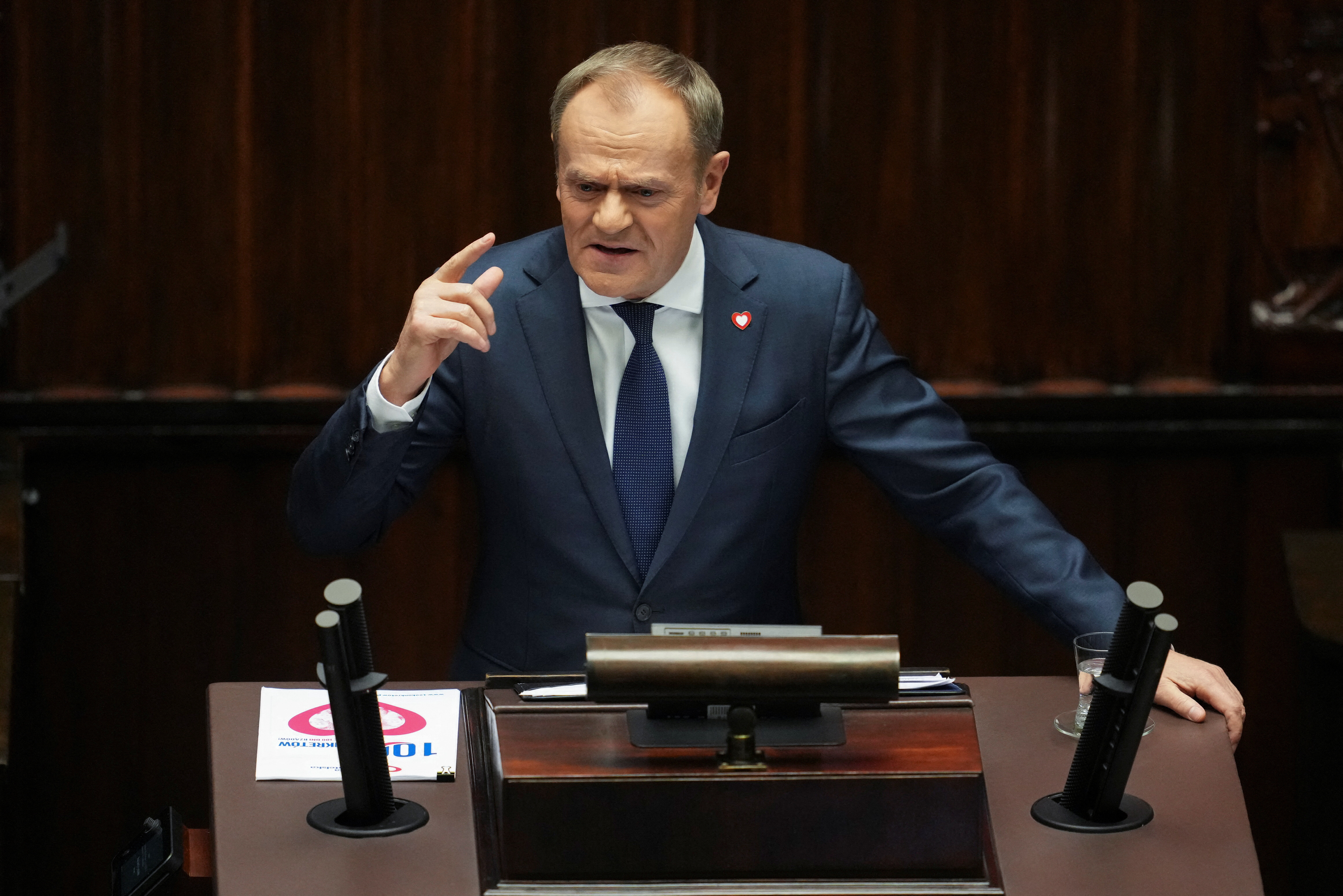 Newly appointed Polish PM Tusk presents government's programme in Warsaw