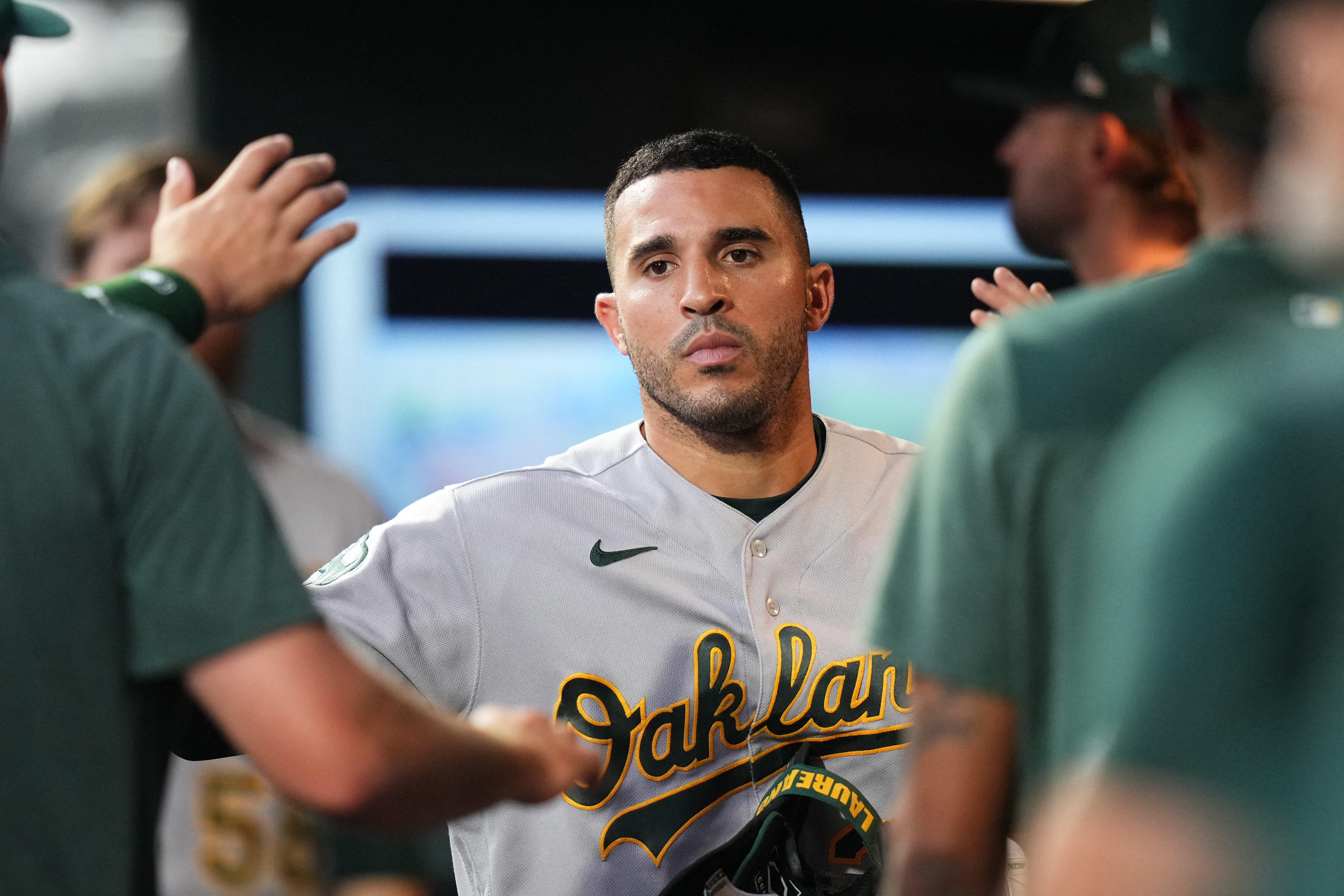 A's explode for 11 runs in walloping Rockies