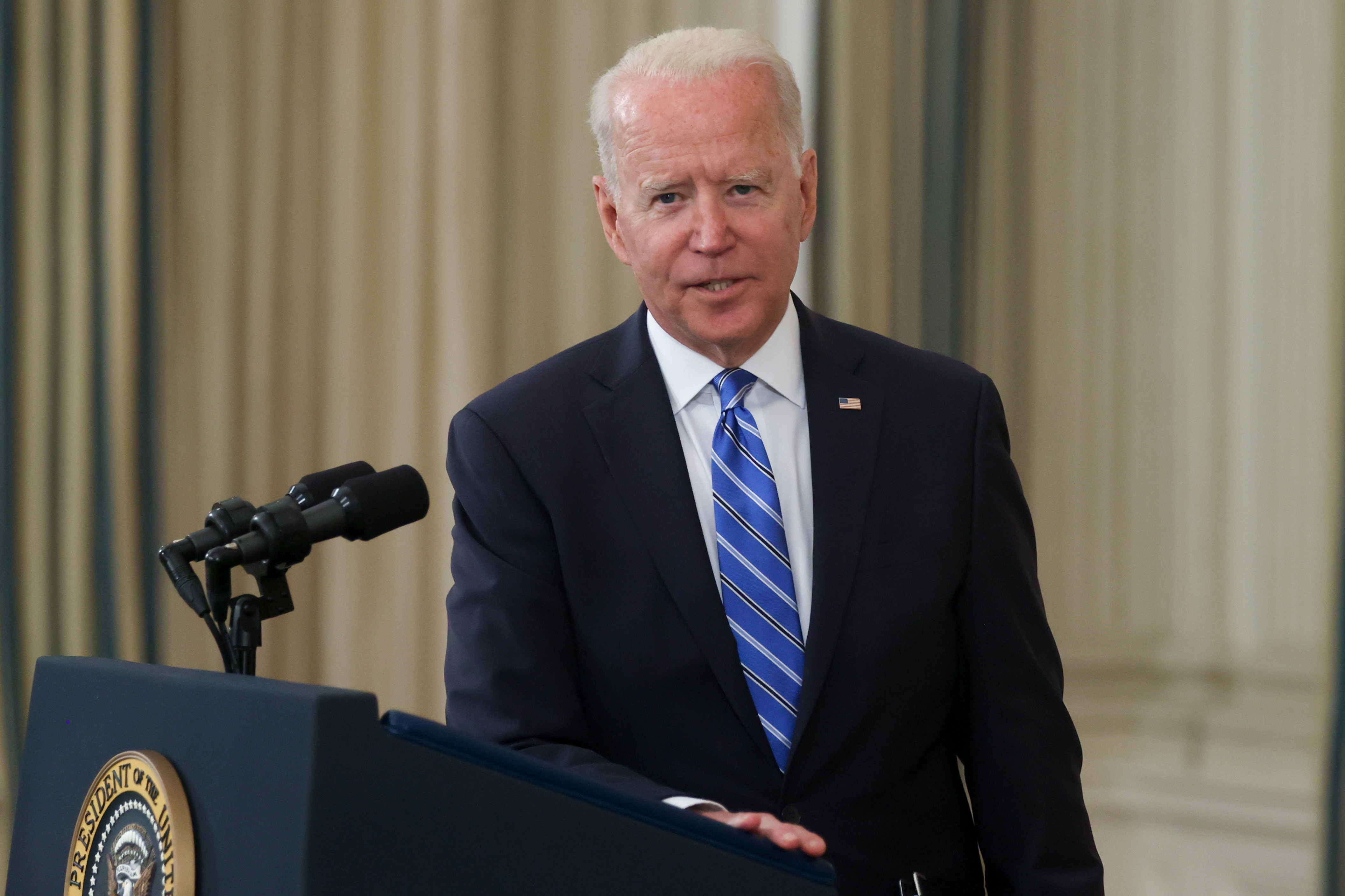 U.S. President Joe Biden takes questions from reporters after delivering remarks on the economy at the White House in Washington