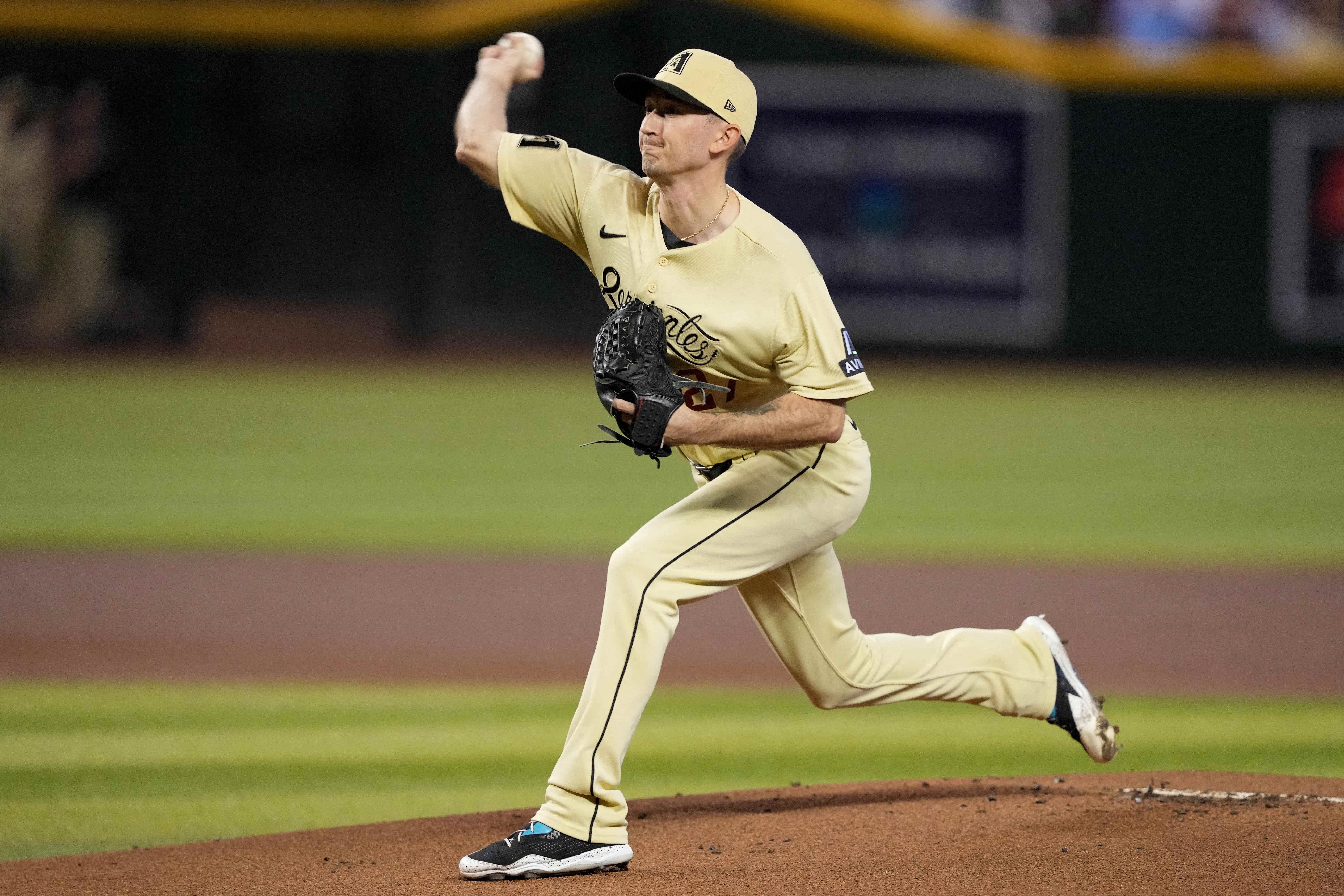 Diamondbacks rally for two runs in 13th to stun Cubs