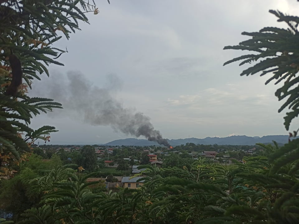 Smoke rises as security forces fight with rebels opposing ruling junta, in Mobye
