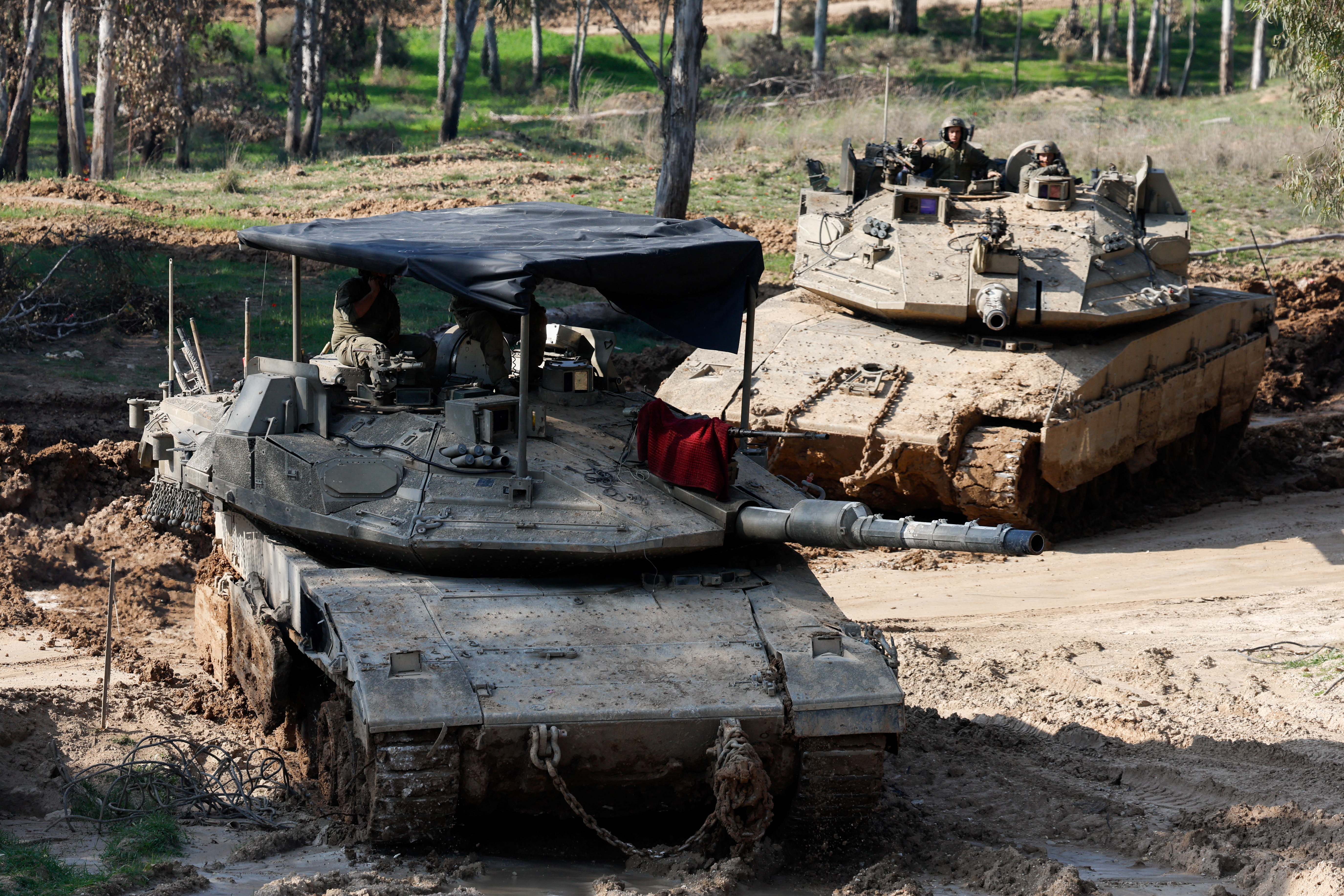 Israeli tanks manoeuvre near the northern Gaza Strip border, in Israel