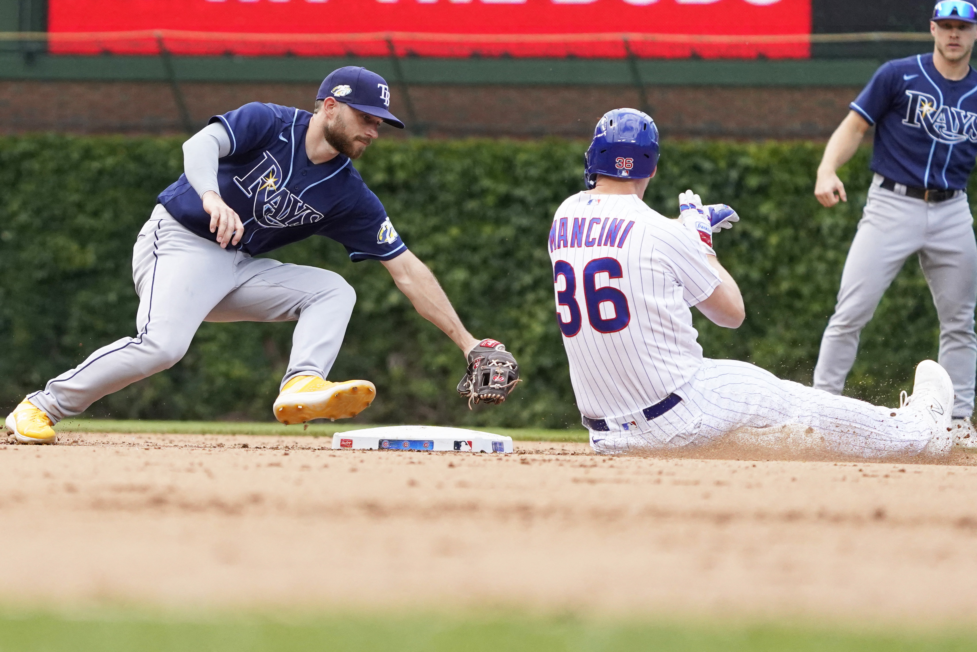 Late longballs help Rays avoid sweep against Cubs