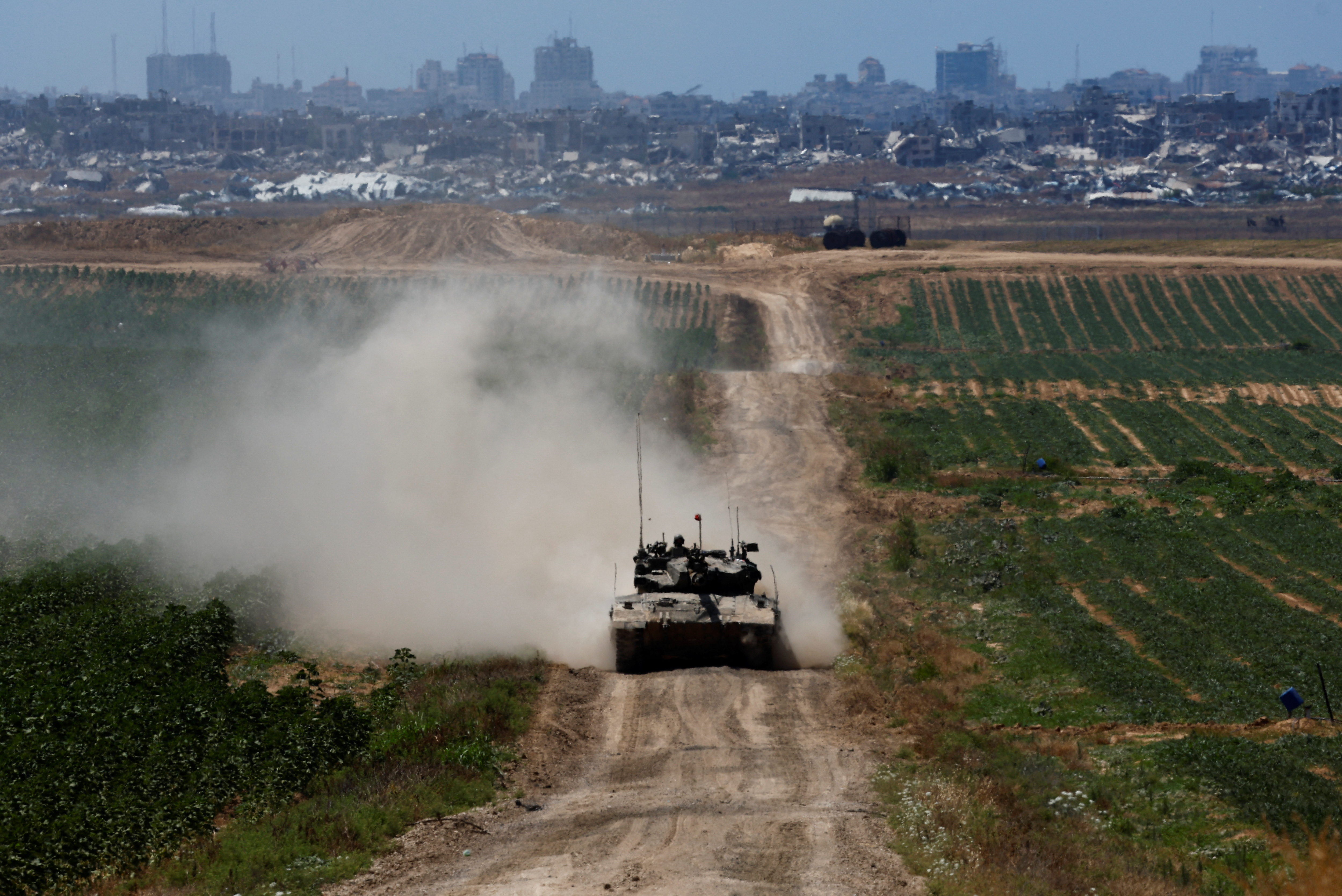 A tank manoeuvres near the Israel-Gaza border