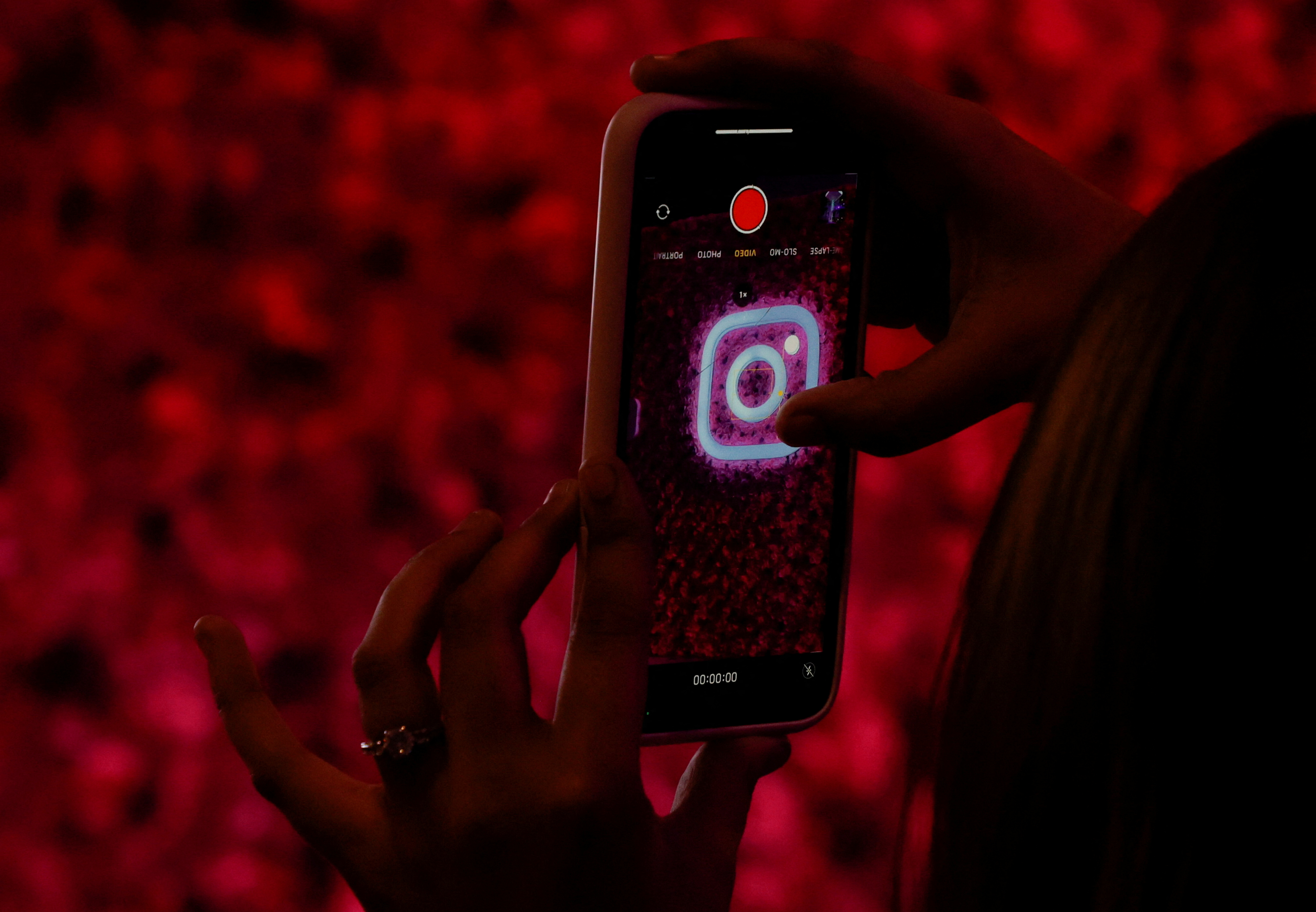 A logo of mobile application Instagram is seen on a mobile phone, during a conference in Mumbai
